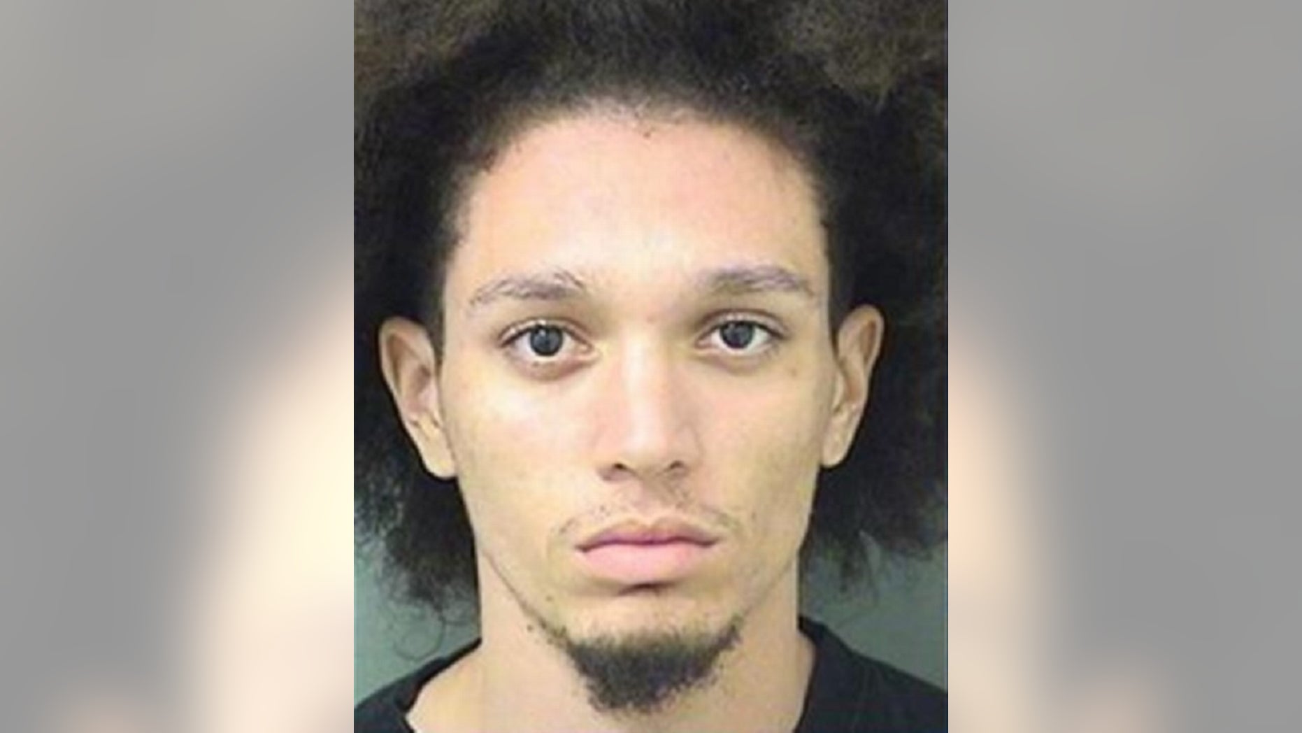 Rafael Decomas, 20, was charged with allegedly sending a written threat to kill or do bodily injury.