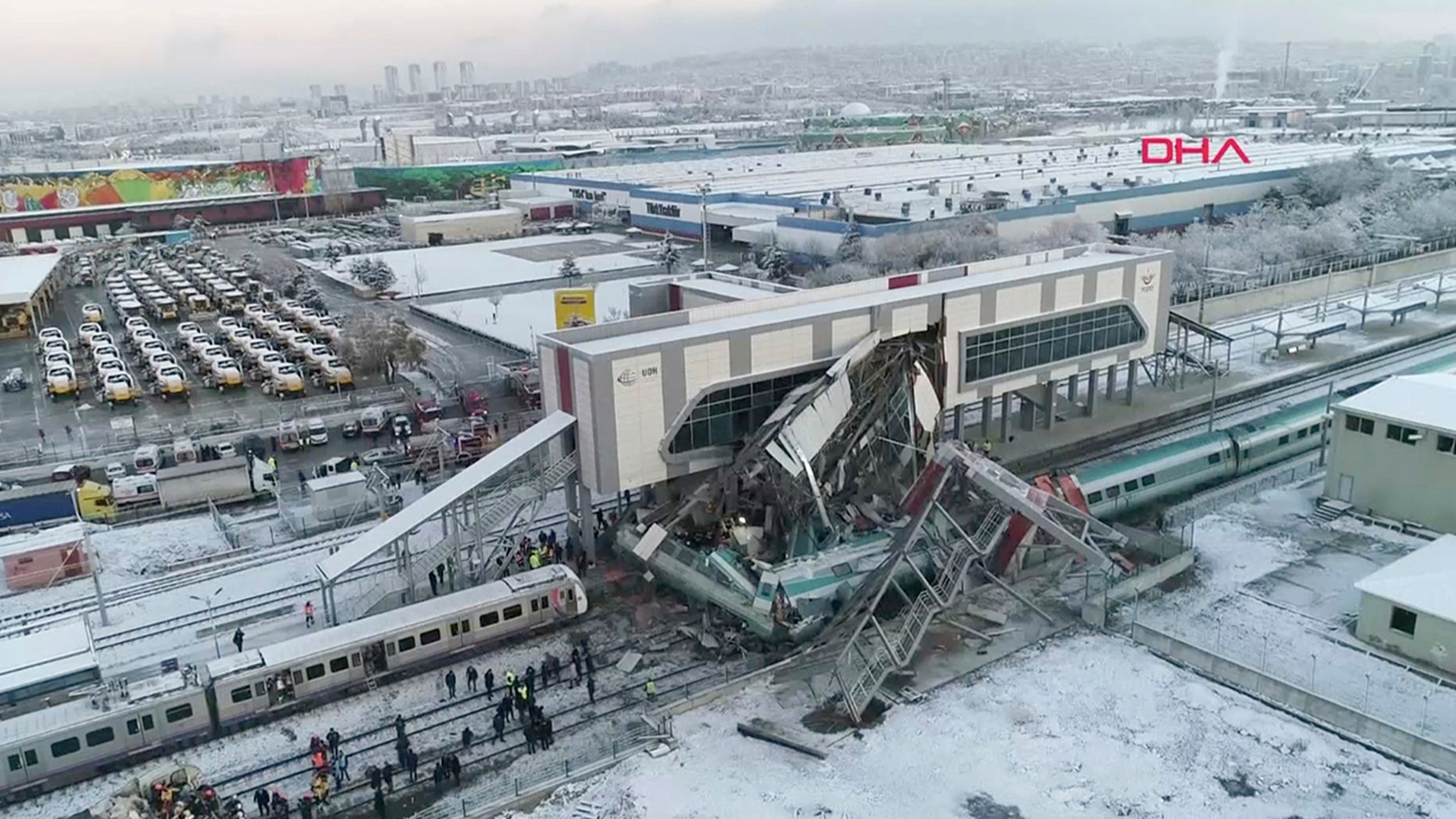 This image made from video shows aftermath of a high-speed train crash at a station in Ankara Turkey Thursday Dec. 13 2018. The train hit a railway engine and crashed into a pedestrian overpass at the station on Thursday