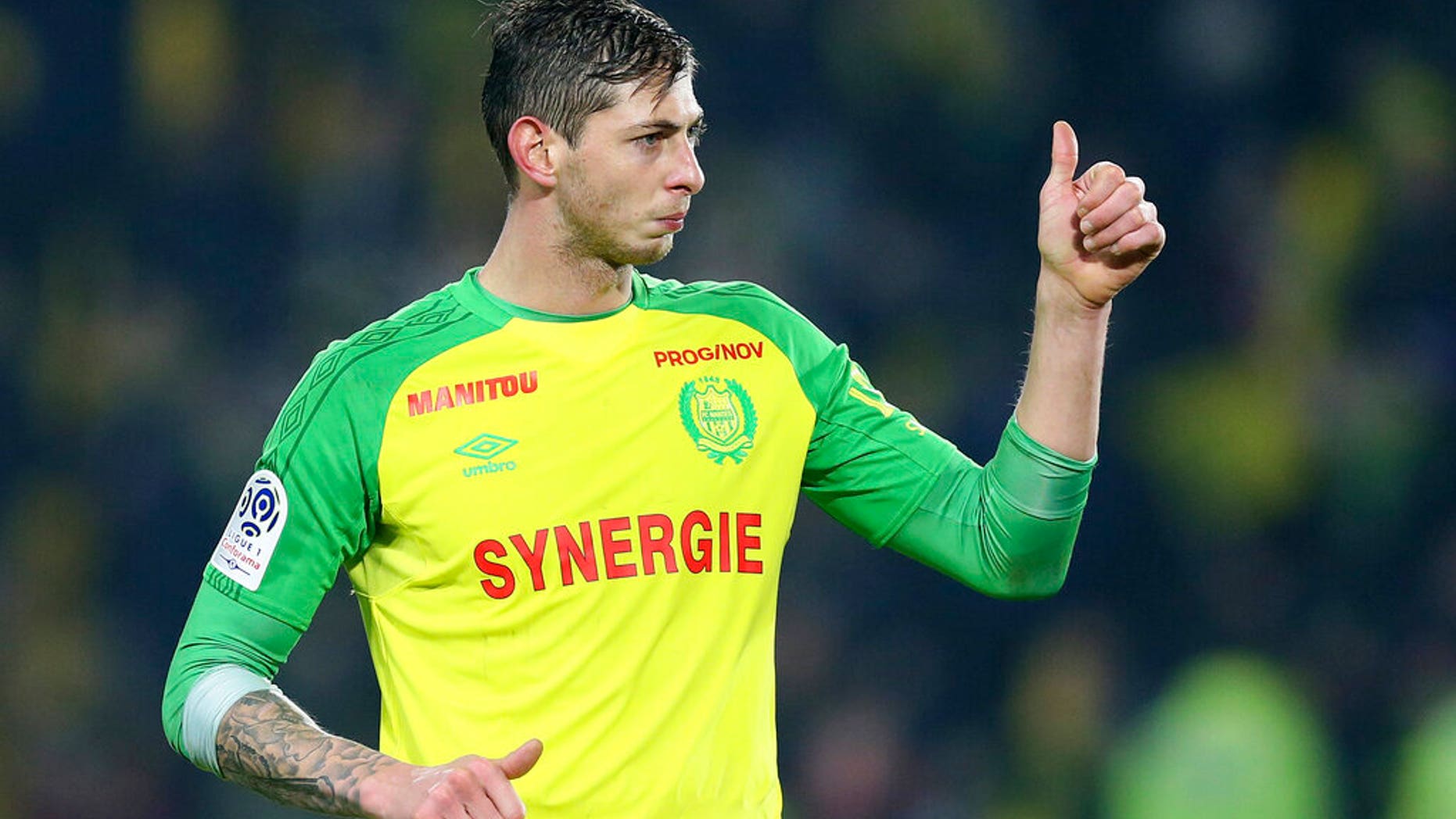 In this his picture taken on Jan. 14, 2018, Argentine soccer player, Emiliano Sala, of the FC Nantes club, western France, gives a thumbs up during a soccer match against PSG in Nantes, France.