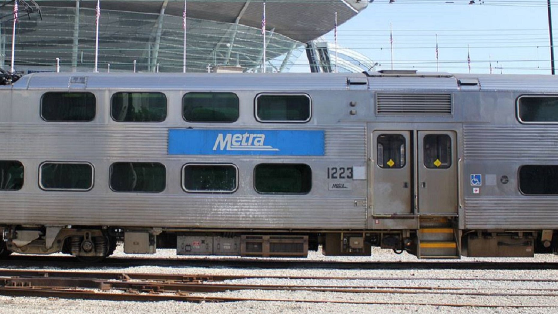 A police officer and two bystanders pulled a 96-year-old driver out of her vehicle moments before a train smashed into it near Chicago on Monday night, reports said. (Facebook)
