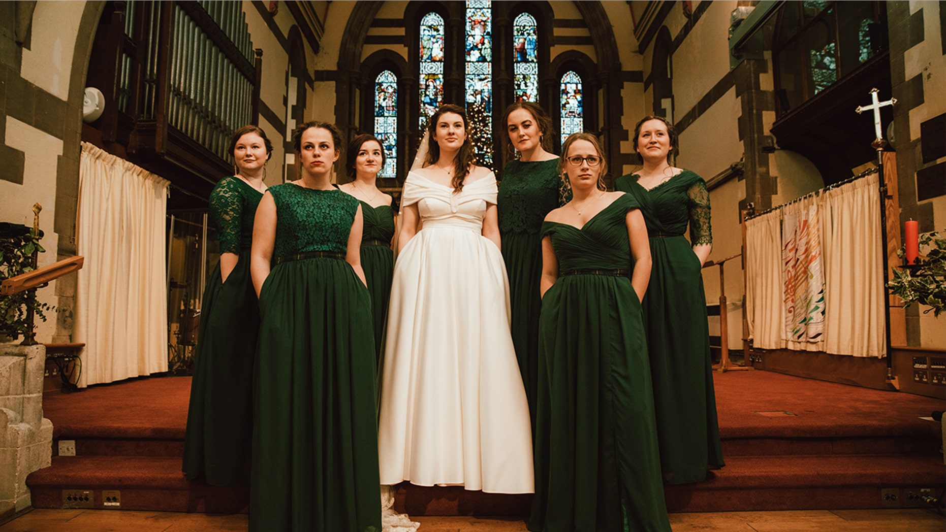 One savvy bride made sure her bridesmaids looked – and felt – their best on her wedding day, outfitting her six pals in bespoke, floor-length gowns complete with practical pockets.