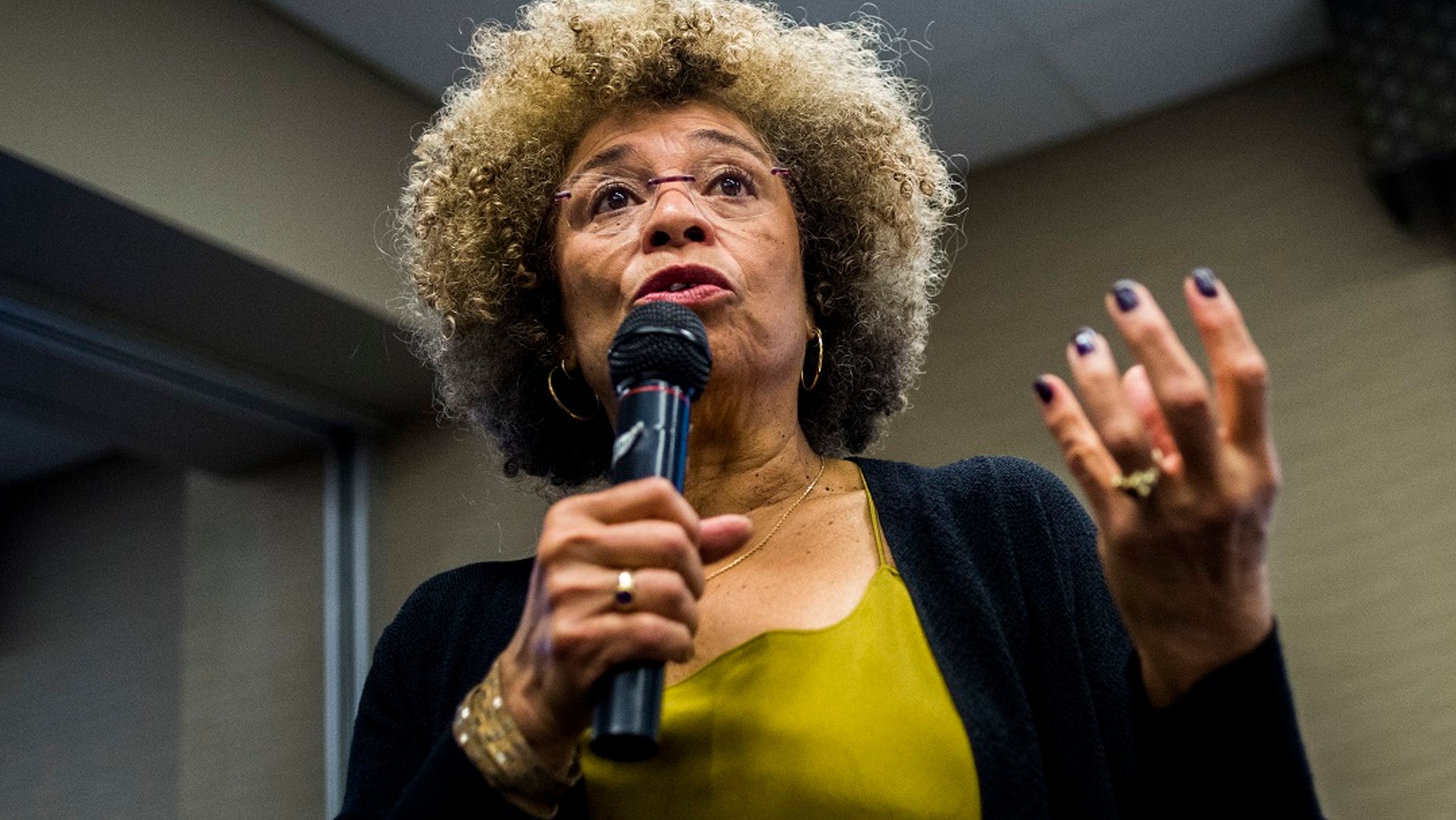 Rustin bayard mlk man history hand right gay nearly written why rights civil updated leader Angela Davis, former fugitive wanted by FBI, to offer MLK Day lecture