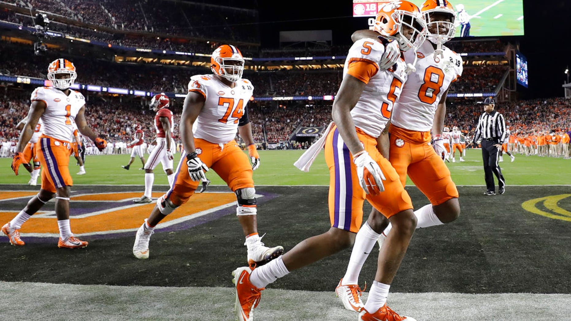 Clemson's Tee Higgins (5) celebrates his touchdown catch during the second half of the NCAA college football playoff championship game against Alabama, Monday, Jan. 7, 2019, in Santa Clara, Calif. (AP Photo/David J. Phillip)