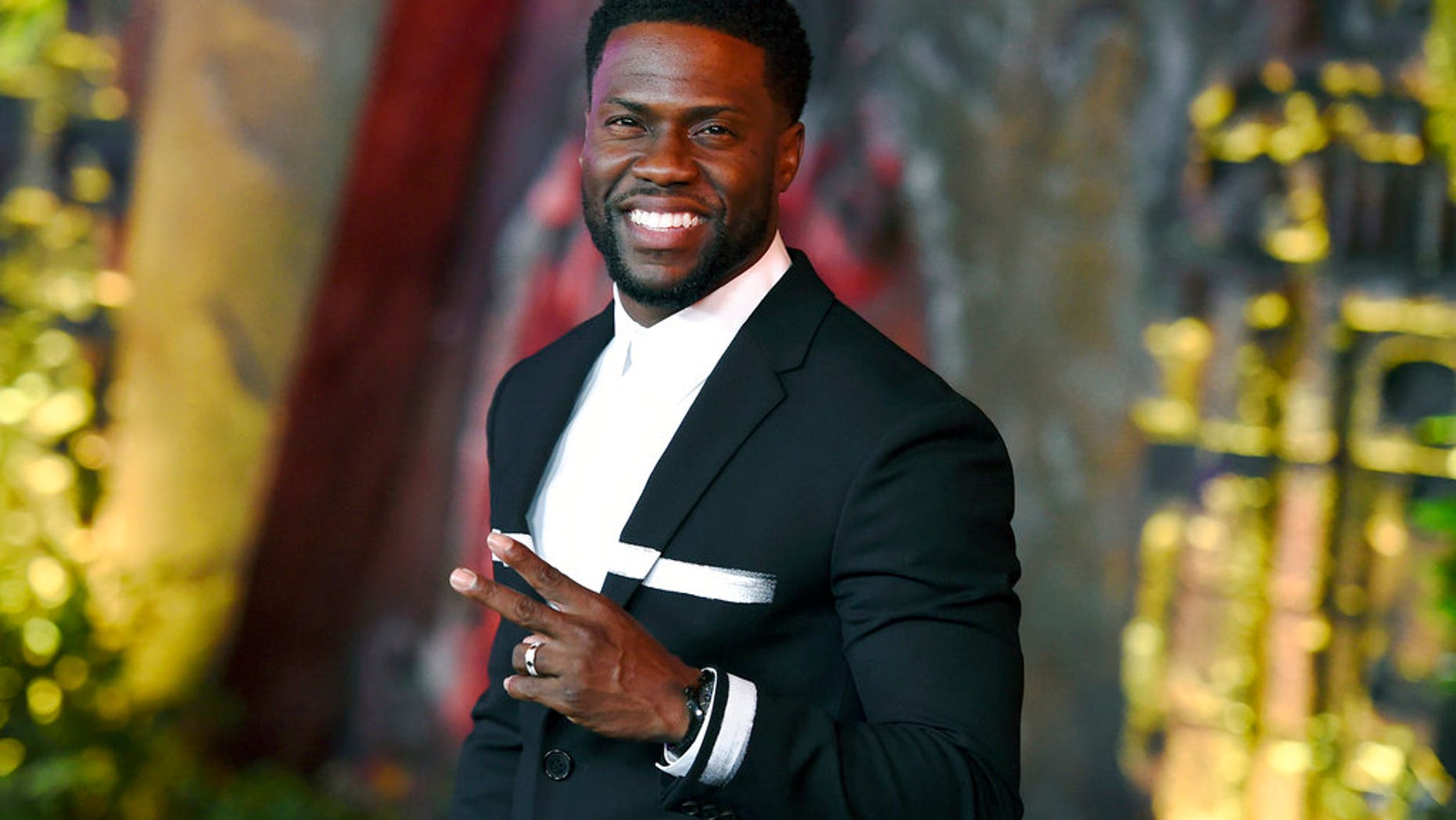 FILE: Kevin Hart arrives at the Los Angeles premiere of