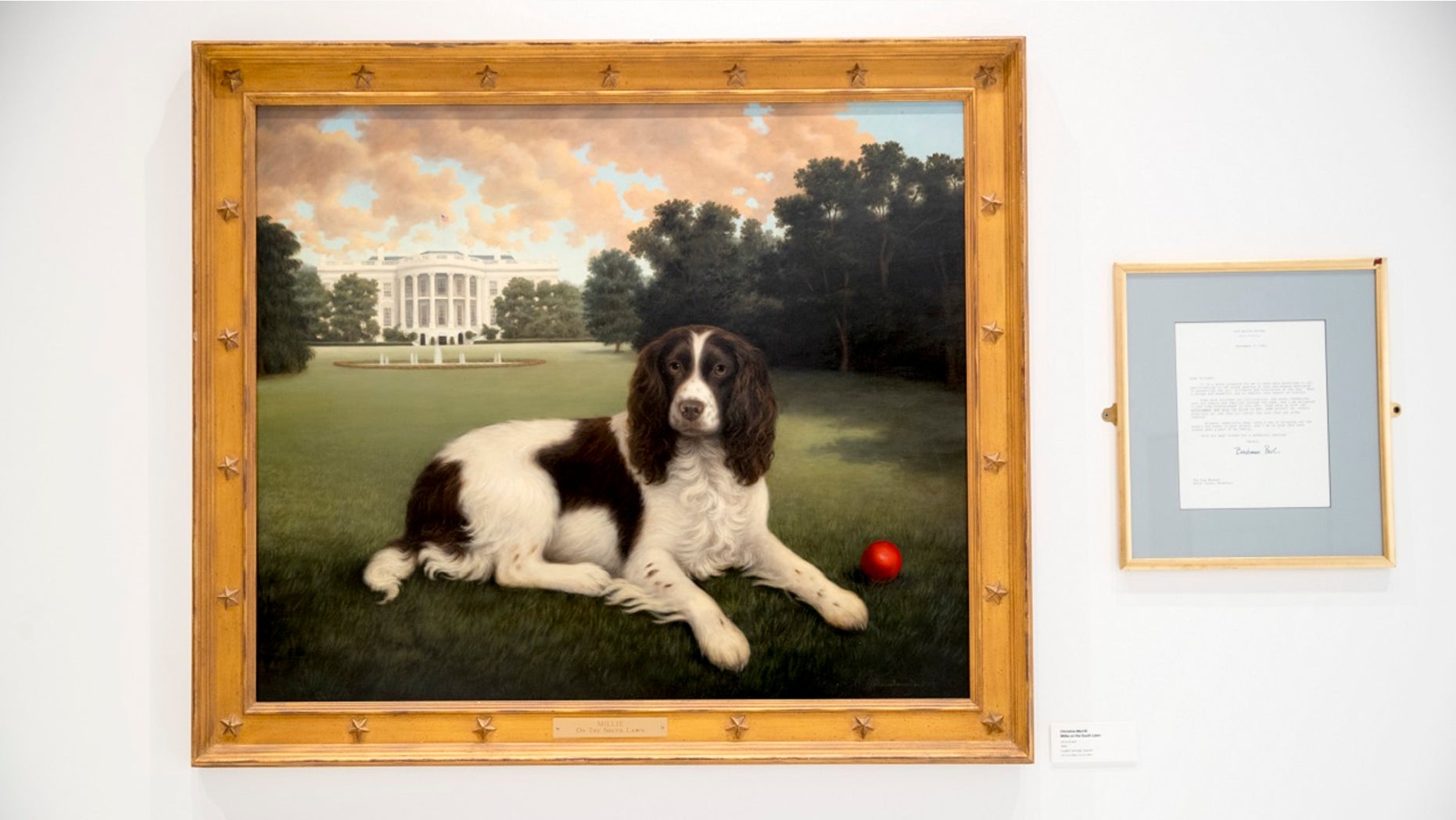 "Millie on the South Lawn" by Christine Merrill, alongside a letter from the late former first lady Barbara Bush, on display at the American Kennel Club Museum of the Dog in New York City, Jan. 9, 2019. The museum opens Feb. 8. (Associated Press)