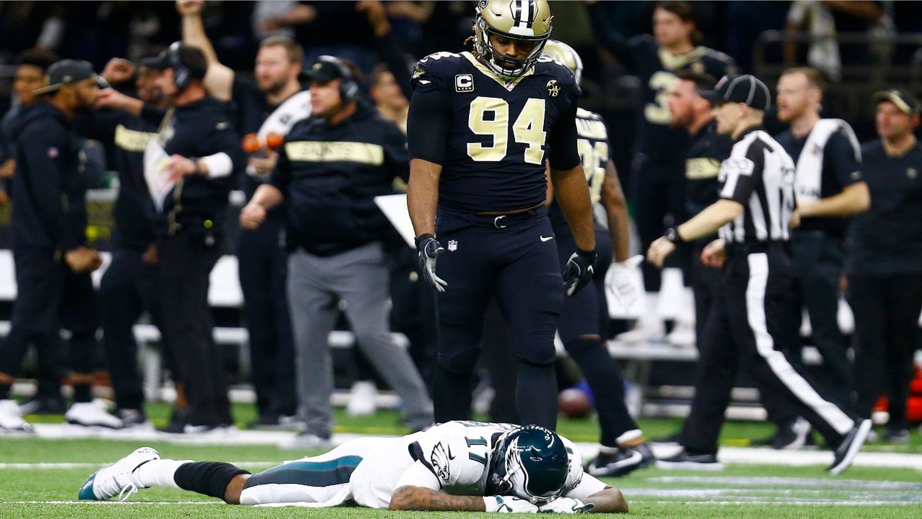 Philadelphia Eagles wide receiver Alshon Jeffery (17) lies on the turf in front of New Orleans Saints defensive end Cameron Jordan (94) after the Saints intercepted a pass in the second half of an NFL divisional playoff football game in New Orleans, Sunday, Jan. 13, 2019. The Saints won 20-14.(Associated Press)