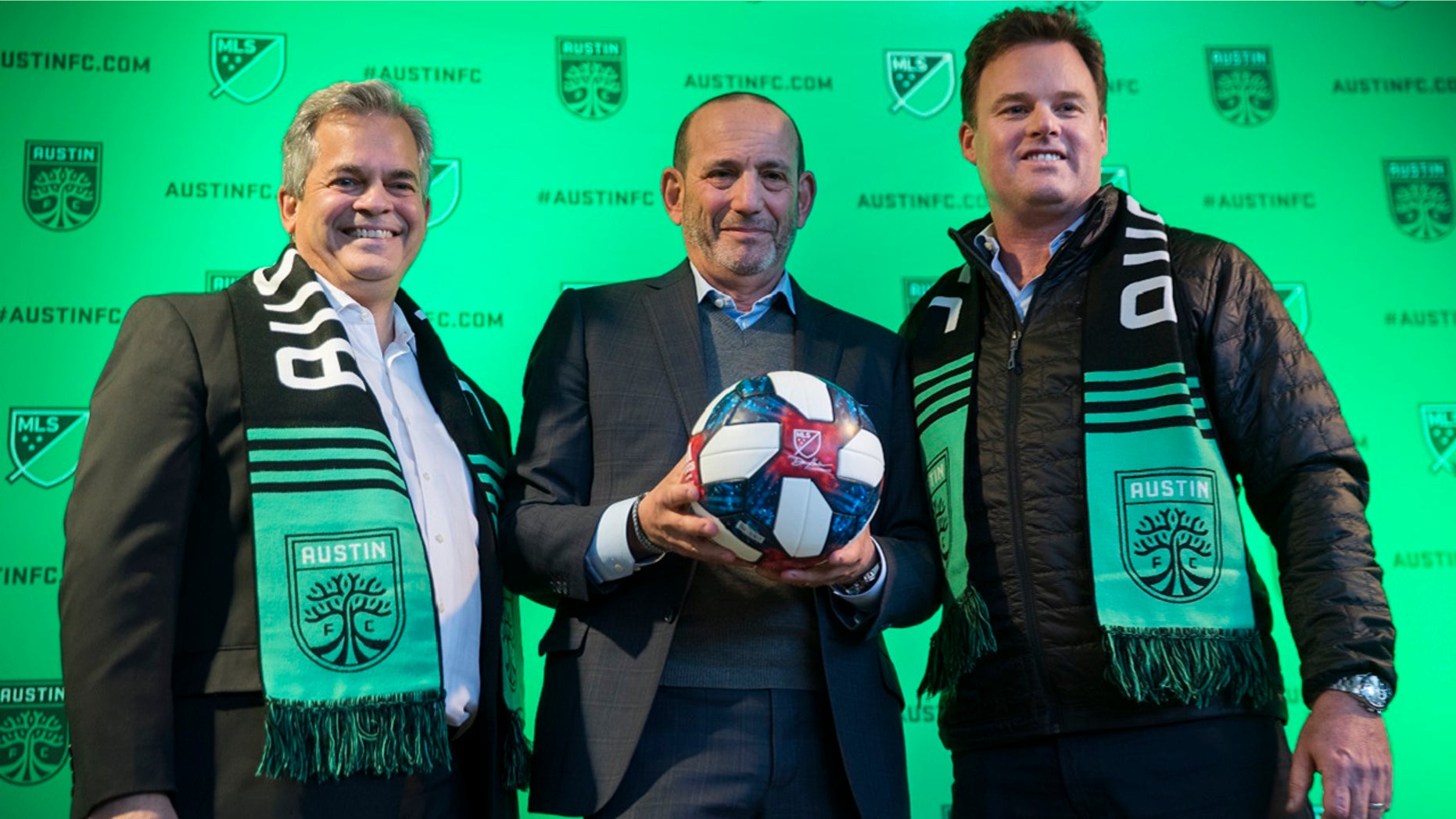 Austin Mayor Steve Adler, left, Major League Soccer Commissioner Don Garber and Austin majority owner Anthony Precourt, after the official announcement that Austin will be an expansion franchise for the 2021 season, Tuesday, Jan. 15, 2019 in Austin, Texas.