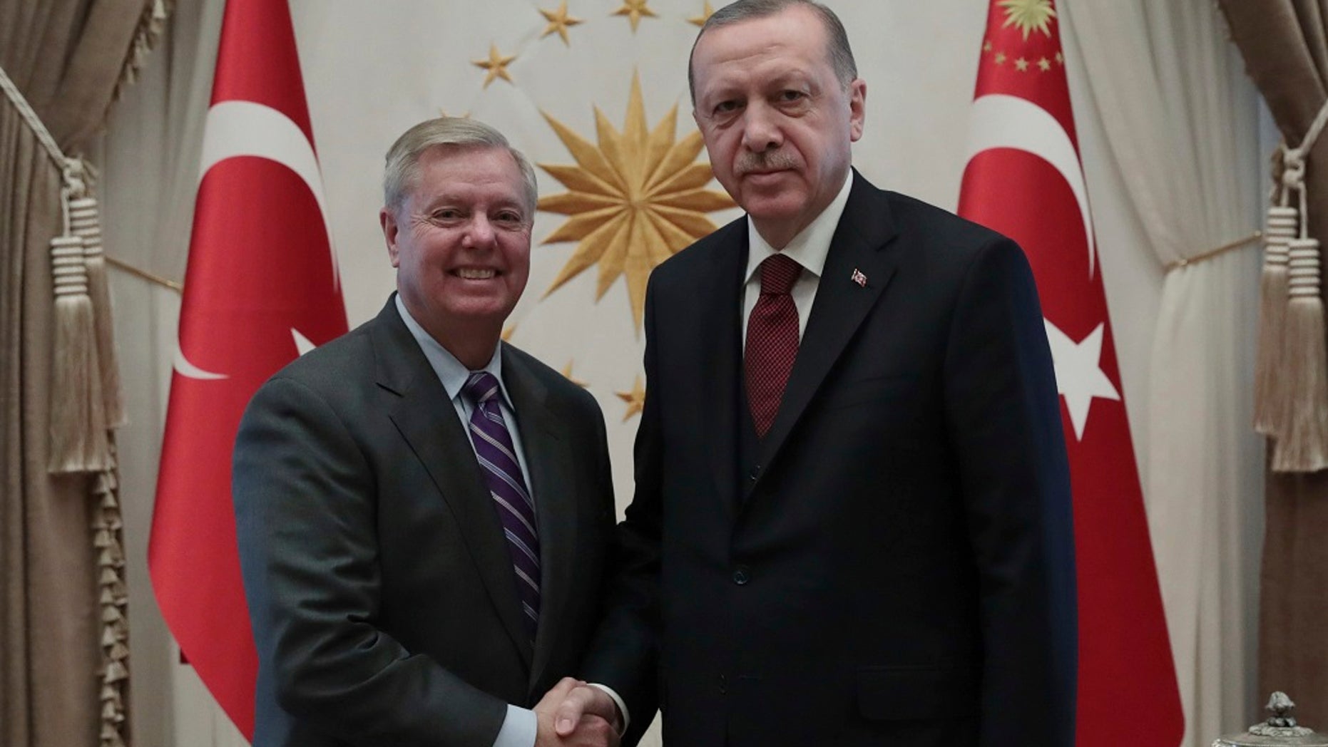 U.S. Sen. Lindsey Graham, R-S.C., left, meets with Turkey's President Recep Tayyip Erdogan, in Ankara, Turkey, Jan. 18, 2019. (Presidential Press Service via AP, Pool)