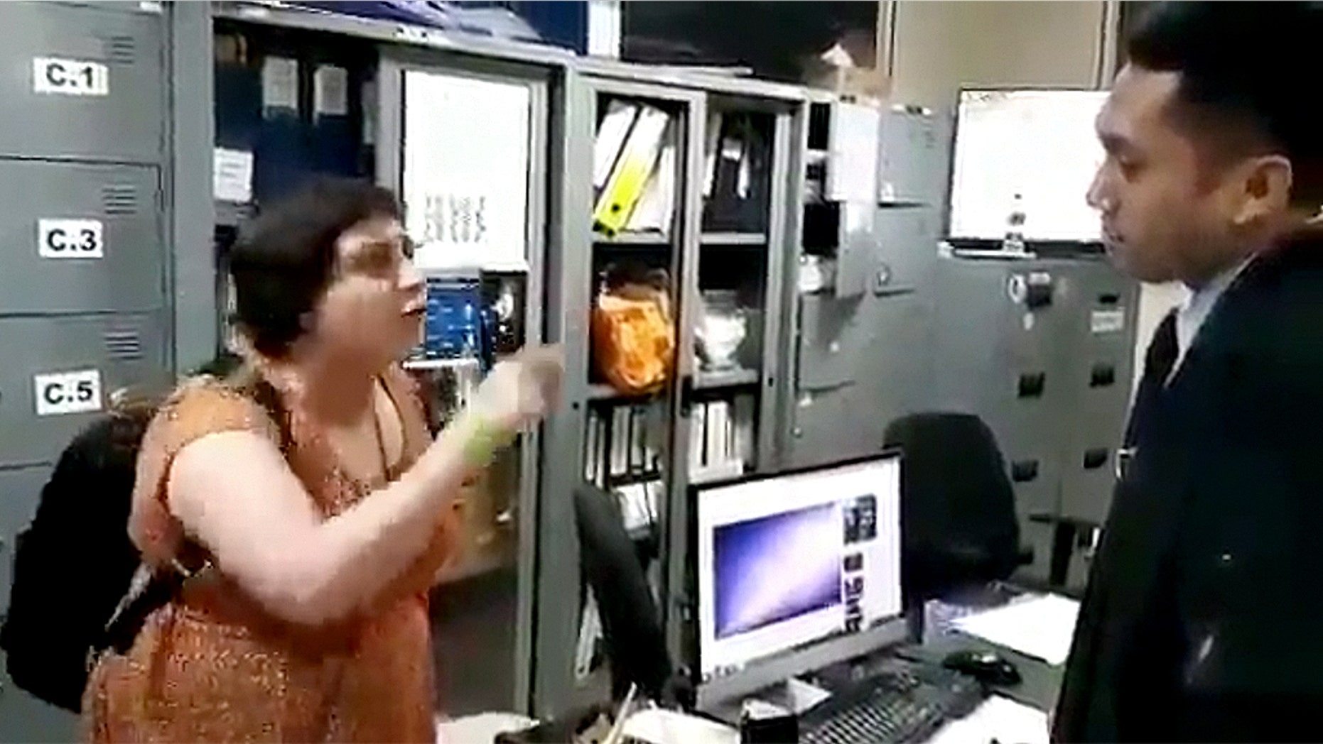 A video that was posted online shows Auj-e Taqaddas, 43, appearing to strike and swear at him when he asked her to pay a hefty fine for overstaying her visa. The video was widely circulated on social media shortly after the 2018 incident.