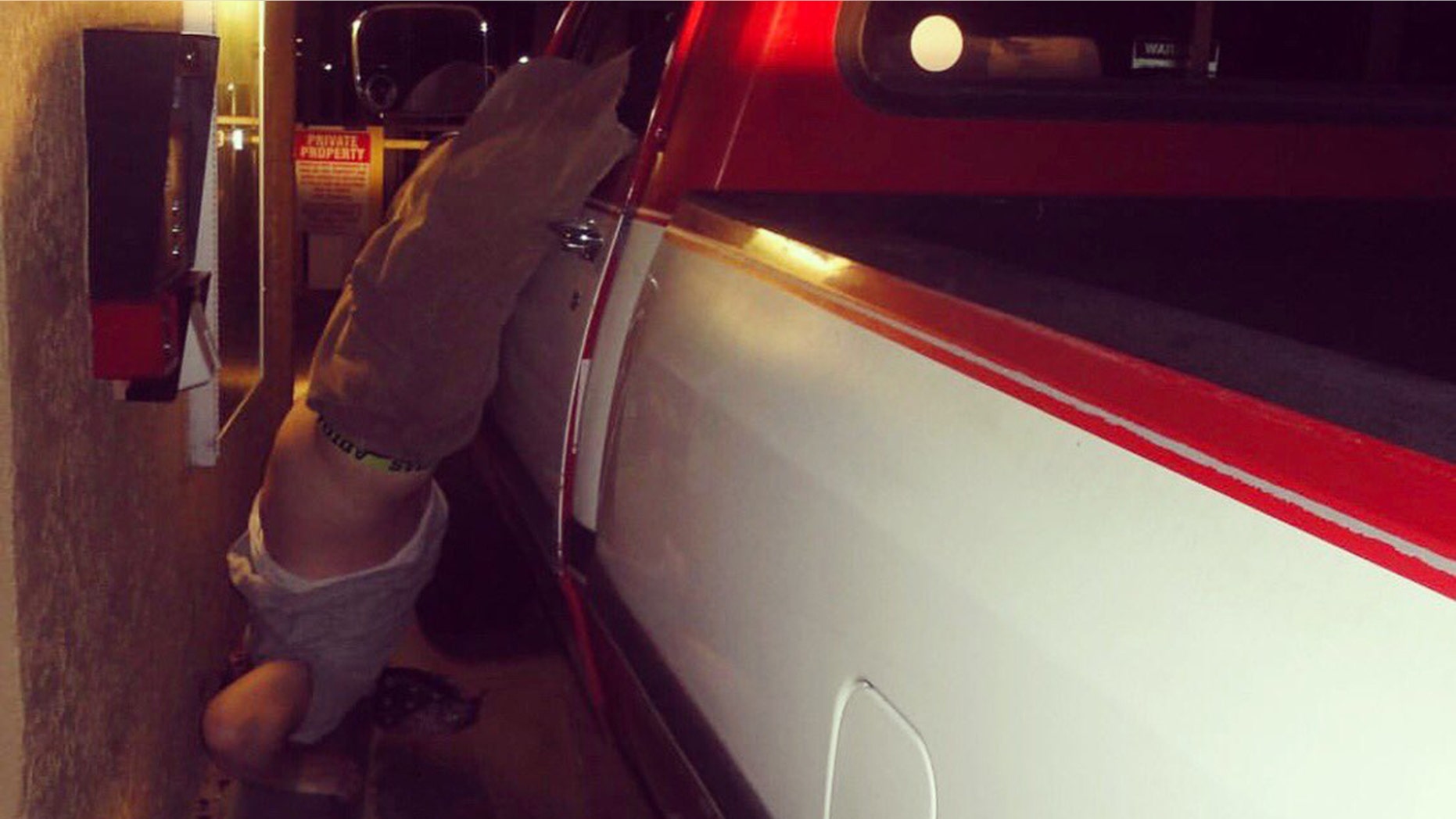 A man was arrested after fleeing a hit-and-run and getting his foot stuck on the steering wheel, police said.
