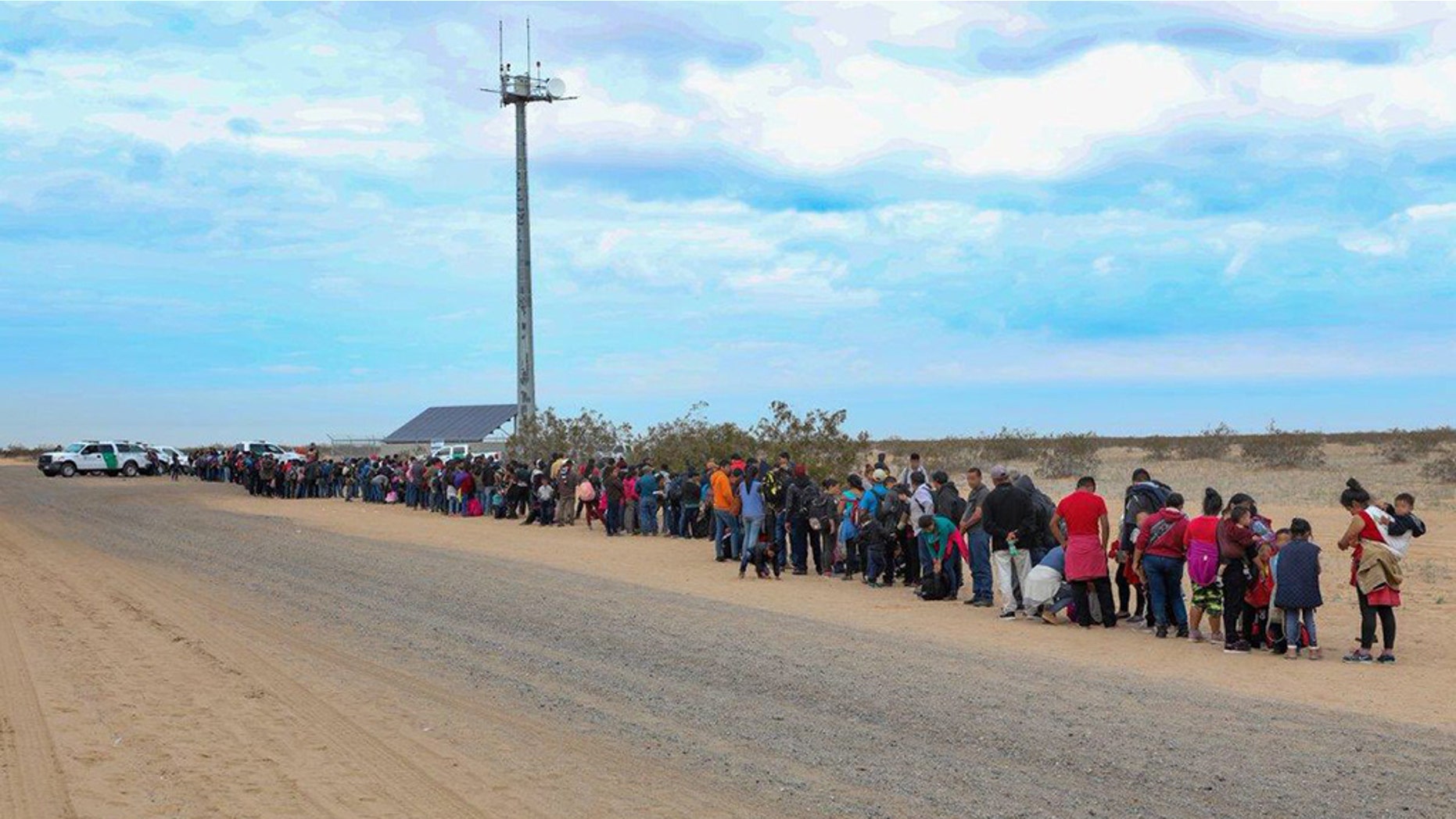 A group of 376 Central Americans reportedly made their way into the U.S. at the Arizona border this week by using short holes that were dug beneath the barrier, according to Border Patrol.