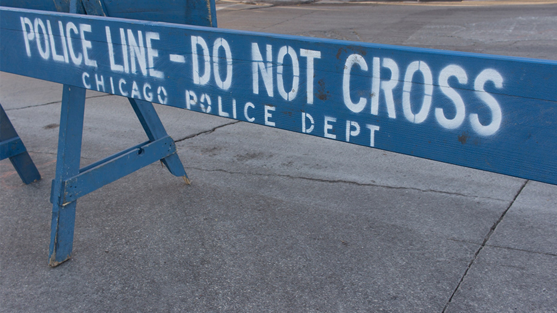 An off-duty Chicago patrolman was fatally shot early Saturday morning while sitting in a parked car together with another man.