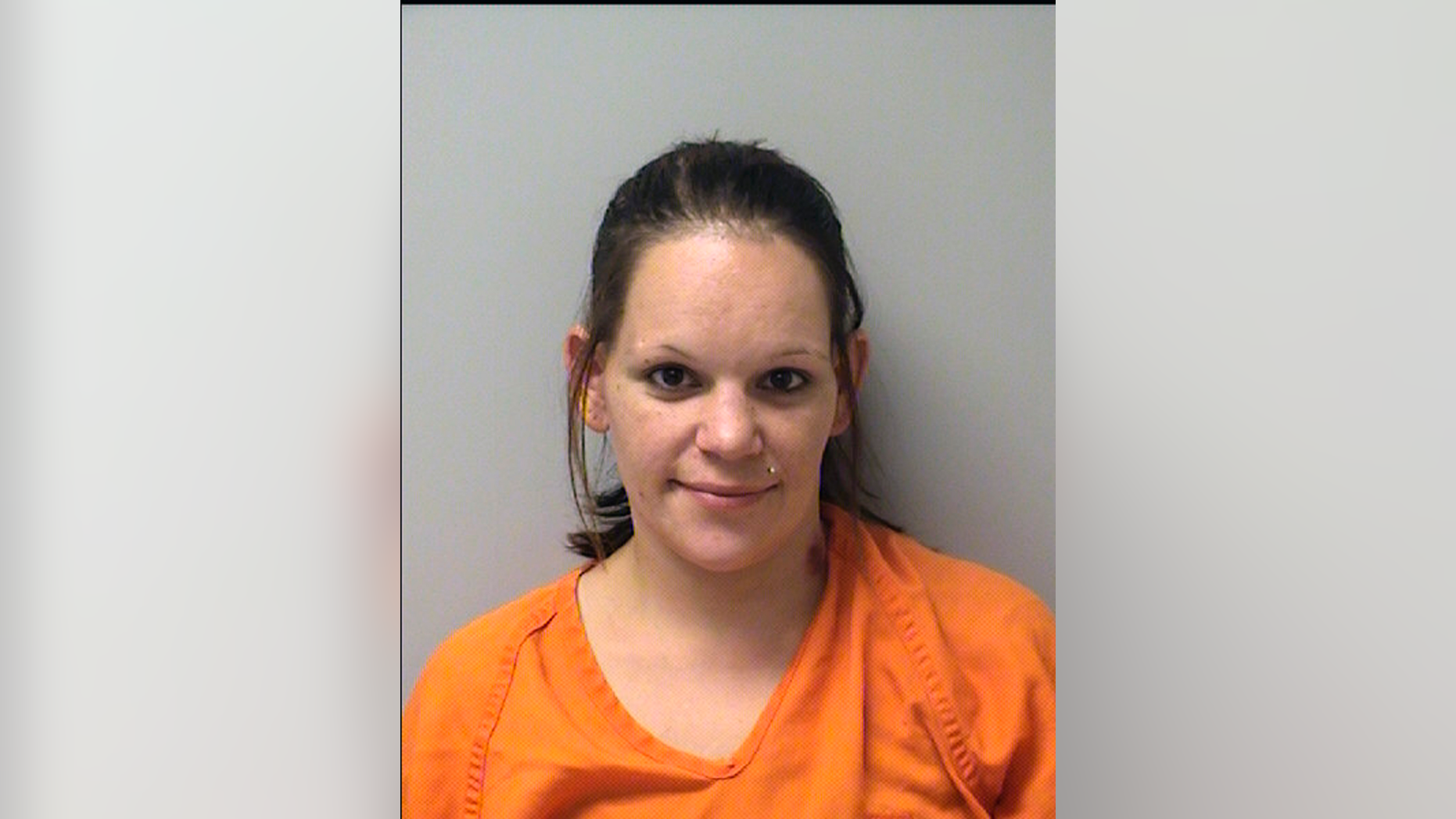 This undated booking photo released by Marathon County Sheriff's Office shows Marissa Tietsort of Wausau, Wis. The Wisconsin baby sitter accused of killing a 2-month-old boy has been charged with first-degree intentional homicide. A criminal complaint filed Friday, Jan. 4, 2019, says Tietsort caused the infant's death in October, then put him in a snowsuit and car seat and let his mother drive him away without telling her the child was dead. Authorities found the mother trying to revive the boy, but he had died hours earlier of blunt force head injuries. (Marathon County Sheriff's Office via AP)