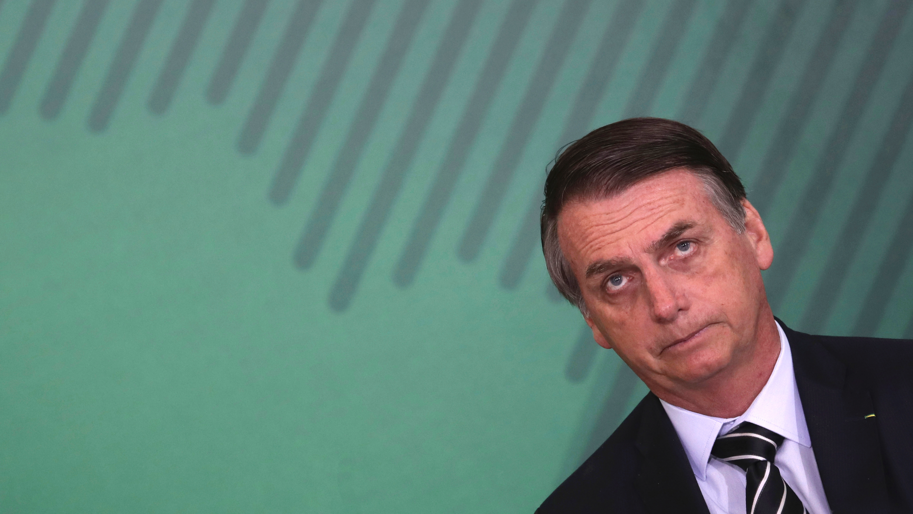 Brazil's President Jair Bolsonaro holds a ceremony to present his cabinet members at the presidential palace in Brasilia, Brazil, Wednesday, Jan. 2, 2019. (AP Photo/Eraldo Peres)