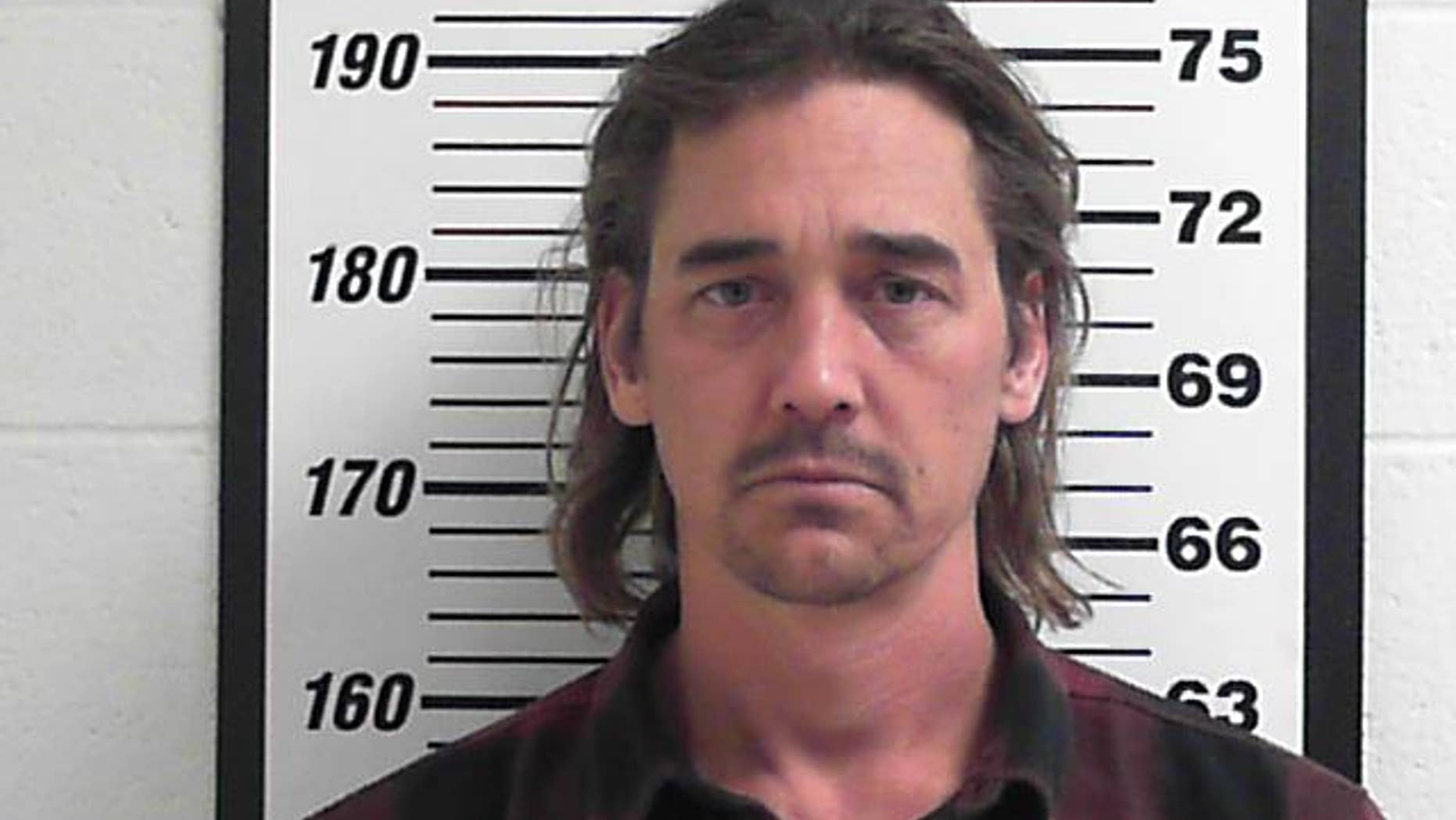 Bryan David Boyak, 43, was arrested after allegedly biting off a chunk of another man's ear off.