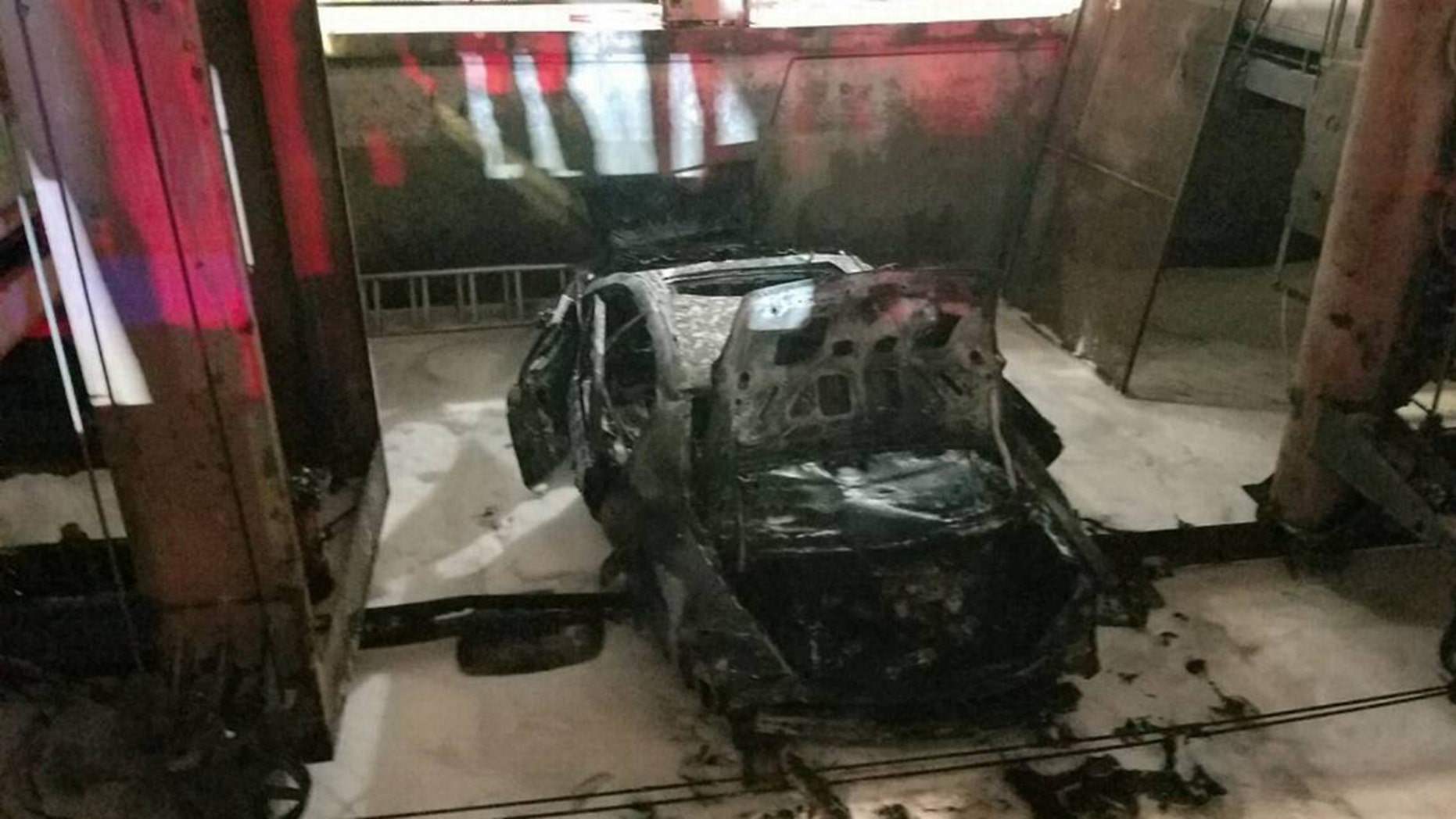 Car plummets down elevator shaft, bursts into flames at Miami parking garage