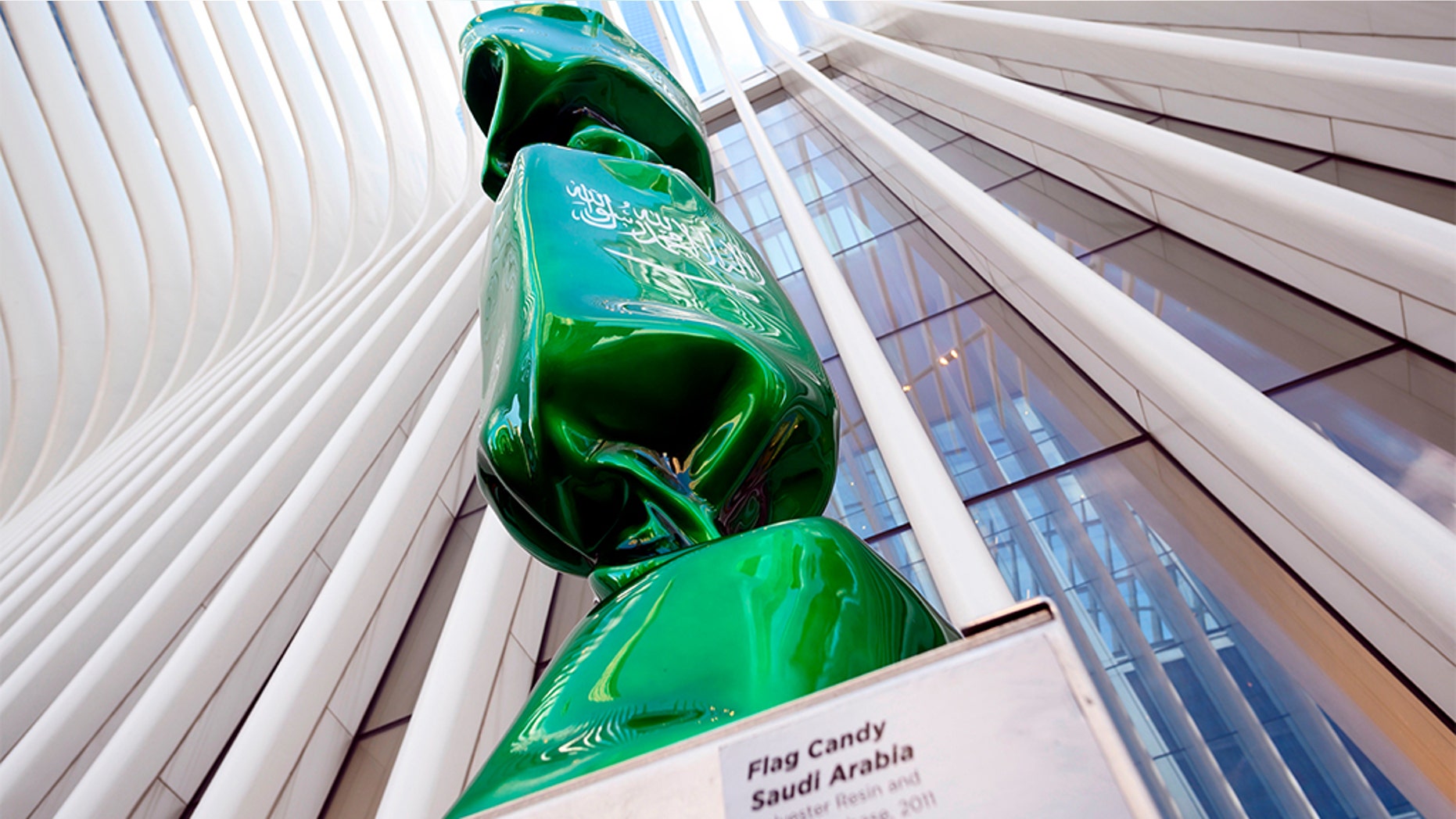 An art exhibit near Ground Zero in New York that features a piece of candy draped in the Saudi Arabian flag will be removed from the site, officials said.