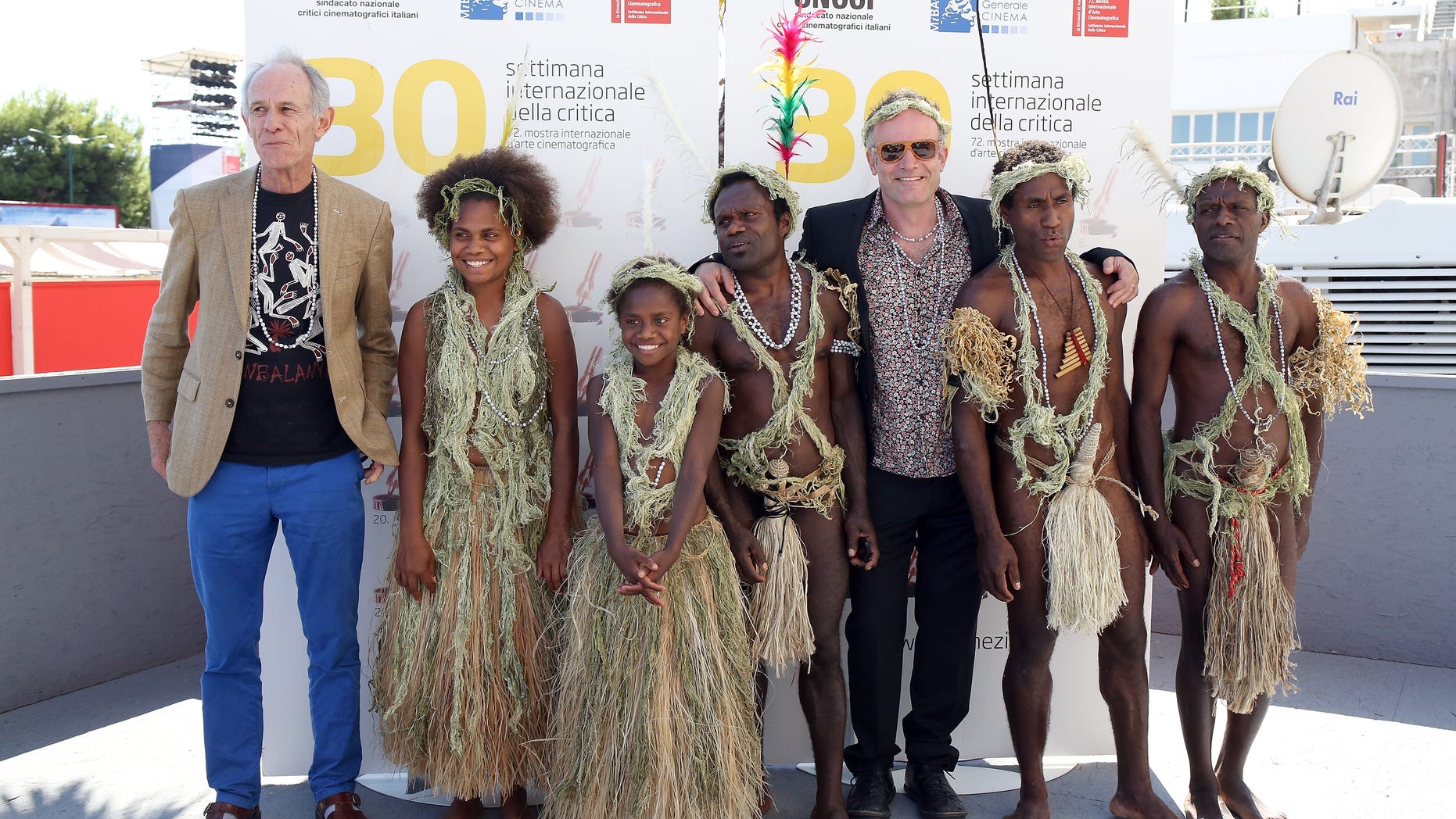 (L-R) Director Martin Butler, Marie Wawa, Marceline Rofit, Lingai Kowia, director Bentley Dean, Mungau Dain and Jimmy Jospeh Nako attend a photocall for 'Tanna' during the 72nd Venice Film Festival. It was reported that Dain has died.