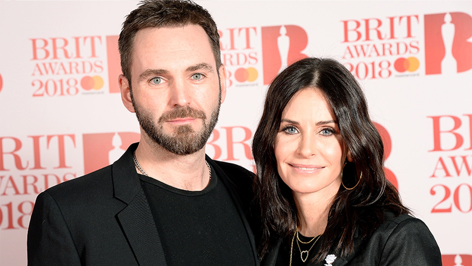 Johnny McDaid and Courteney Cox attend The BRIT Awards 2018 held at The O2 Arena on February 21, 2018 in London, England.