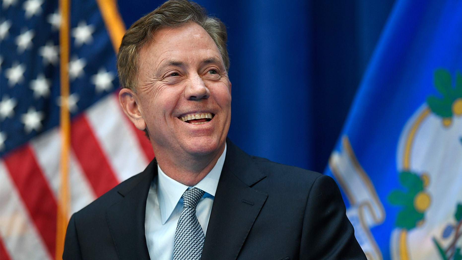 Connecticut Gov. Ned Lamont smiles during his inauguration, Wednesday, Jan. 9, 2019, inside the William A. O'Neill Armory in Hartford Conn. (AP Photo/Jessica Hill, Pool)