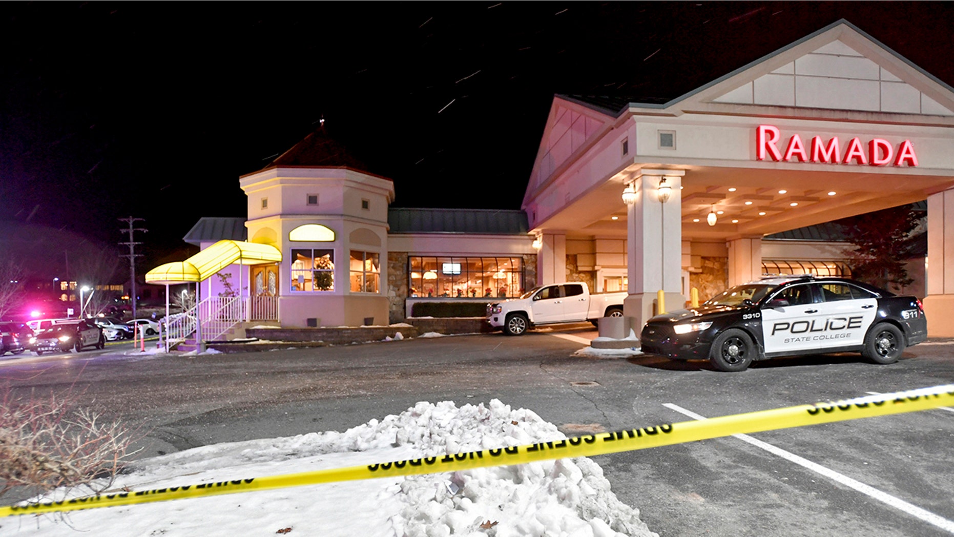 State College Police responded to a shootout at PJ Harrigan's Bar & Grill at the Ramada Inn Thursday, January 24, 2019, at State College, Pennsylvania (Abby Drey / Center Daily Times via AP)