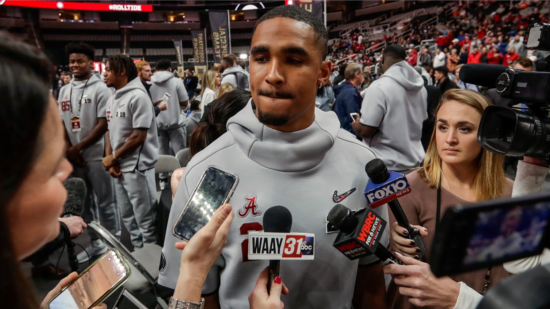 FILE - In this Jan. 5, 2019, file photo, Alabama's Jalen Hurts answers questions during media day for the NCAA college football playoff championship game, in Santa Clara, Calif. (AP Photo/David J. Phillip, File)