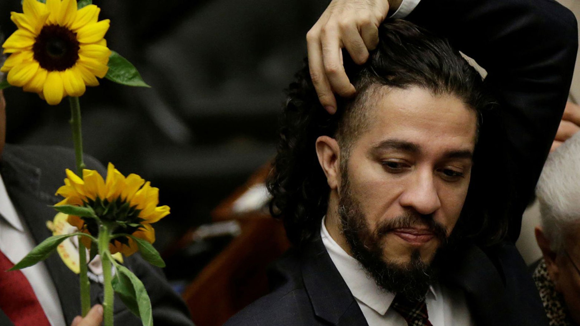 Openly gay Brazilian congressman resigns, flees country over death threats