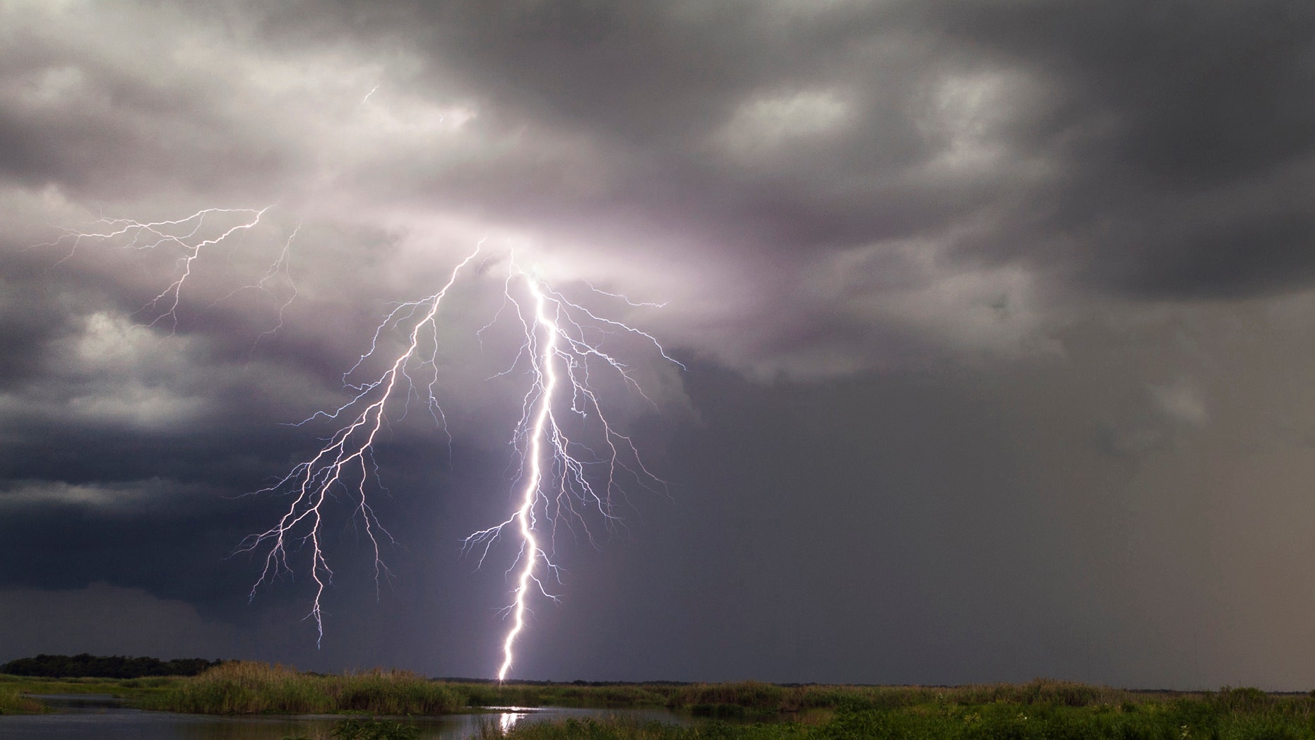 File photo - Negative lightning from a summer thunderstorm pictured in Christmas, Florida, 19 July 2015.