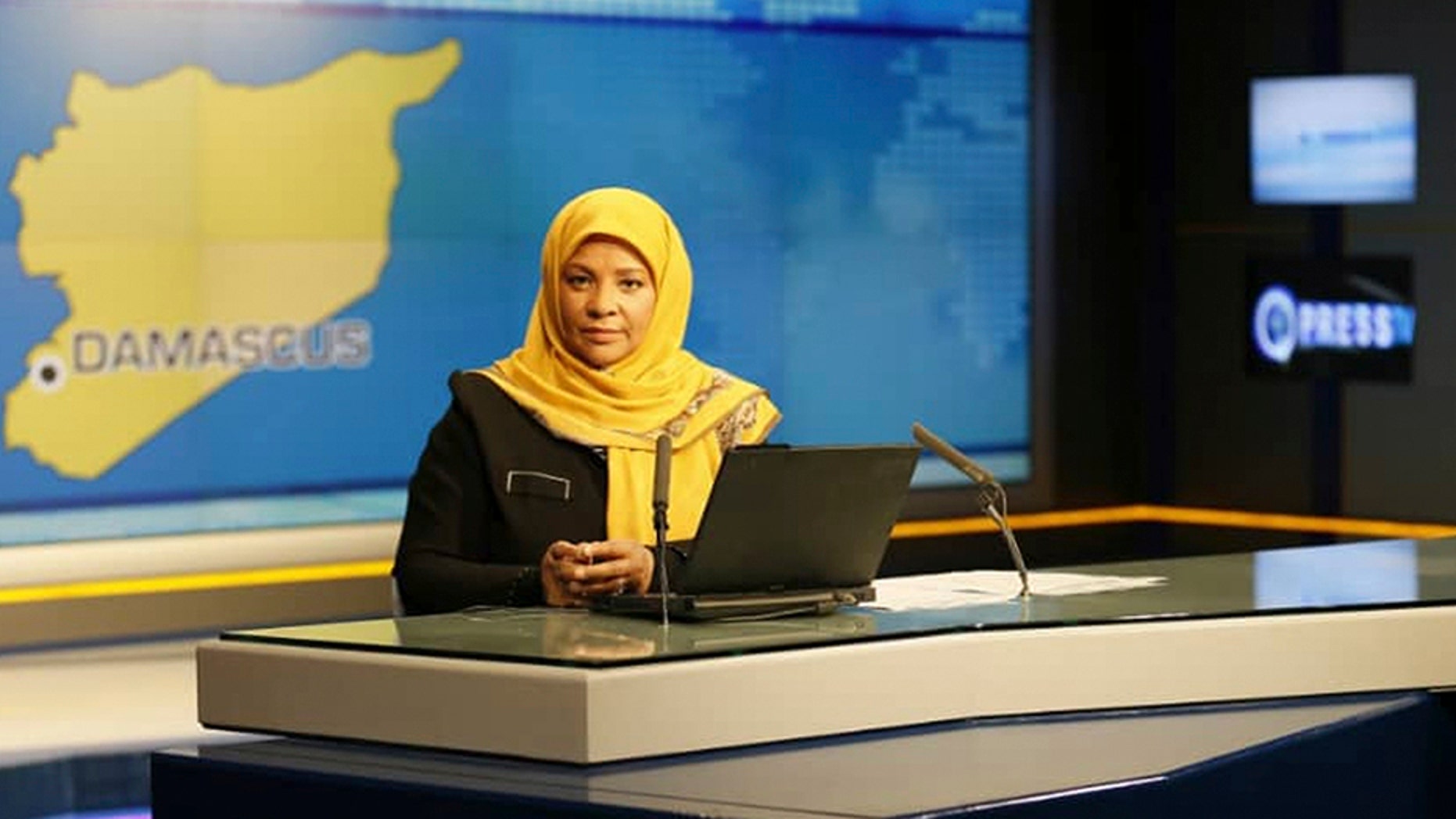 This undated photo provided by Iranian state television's English-language service, Press TV, shows American-born news anchor Marzieh Hashemi at studio in Tehran, Iran.