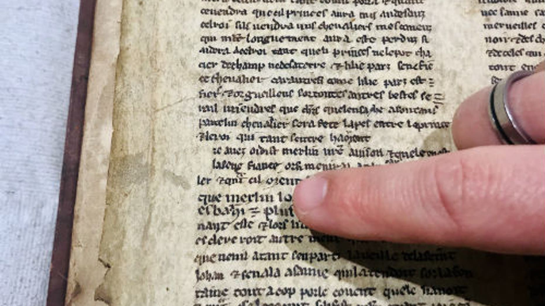 Detail from one of the fragments showing the name Merlin (University of Bristol)