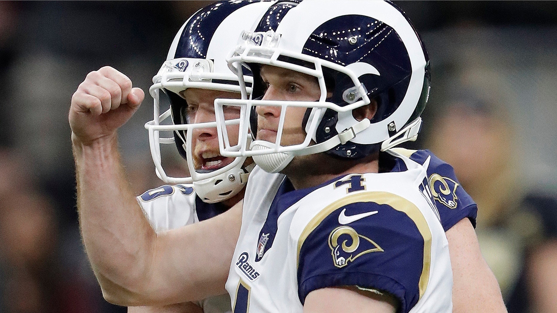 Los Angeles Rams' Greg Zuerlein is congratulated after making the game-winning field goal during overtime of the NFL football NFC championship game against the New Orleans Saints Sunday, Jan. 20, 2019, in New Orleans.