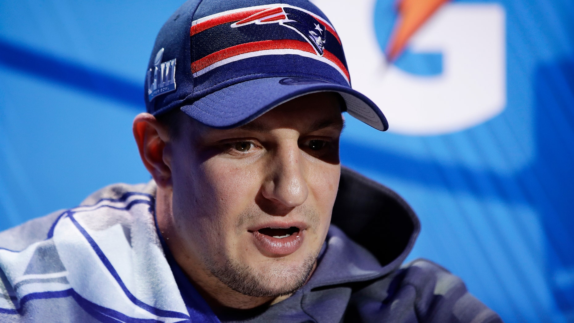 New England Patriots player Rob Gronkowski answers a question during Media Day for Super Bowl LIII, Jan. 28, 2019, in Atlanta. (Associated Press)