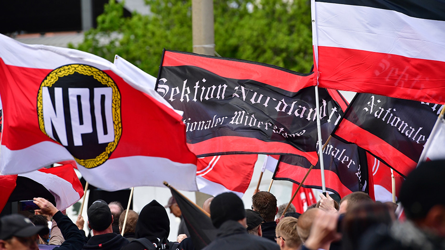 German far-right party threatens to start street patrols after ethnic violence