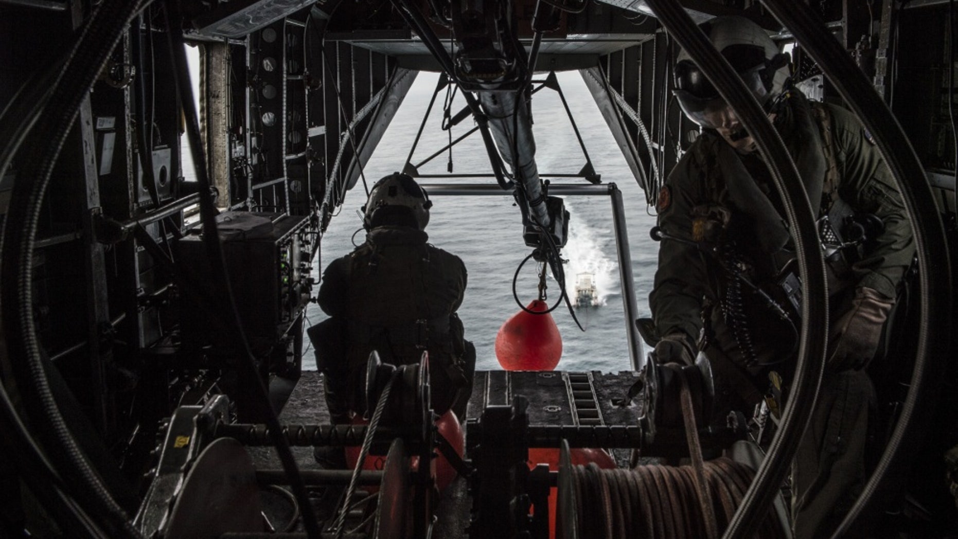 File photo - ARABIAN GULF (May 2, 2015) – Sailors assigned to the Blackhawks of Helicopter Mine Countermeasure Squadron (HM-15) monitor a tow line inside of a MH-53E Sea Dragon pulling an MK-105 Magnetic Influence Minesweeping System during mine countermeasure training operations aboard forward staging base (Interim) USS Ponce (AFSB(I)-15). (U.S. Navy photo by Mass Communication Specialist 1st Class Joshua Bryce Bruns/Released)