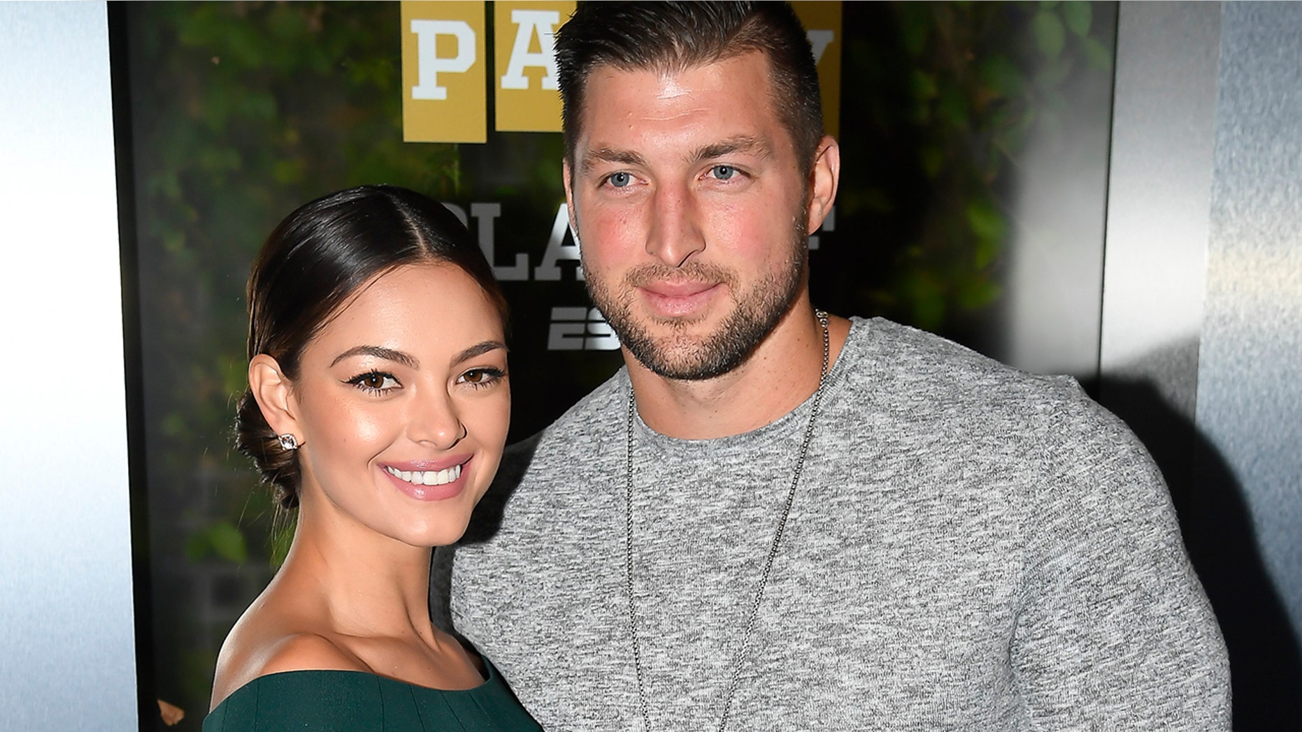 Miss Universe 2017 Demi-Leigh Nel-Peters and Tim Tebow of ESPN attend the Party At The Playoff at The GlassHouse on January 5, 2019 in San Jose, California. The couple became engaged in January 2019.