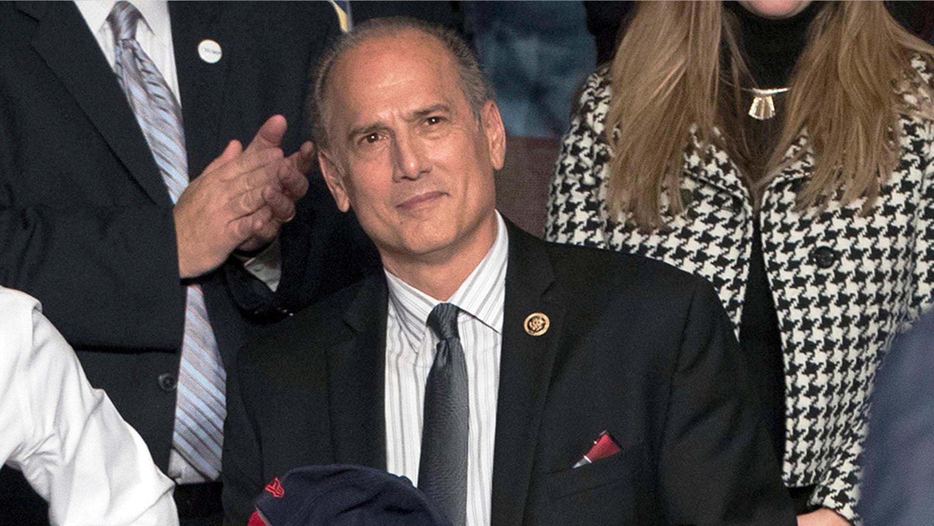 FILE--In this file photo from Dec. 15, 2016 Rep. Tom Marino, R-Pa., stands with other elected officials as then President-elect Donald Trump departs a rally in Hershey, Pa. Marino, a five-term Republican congressman who co-chaired Donald Trump's successful presidential campaign in Pennsylvania, said in a statement Thursday that his last day will be Jan. 23 and that he's taking a job in the private sector.(AP Photo/Matt Rourke, file)