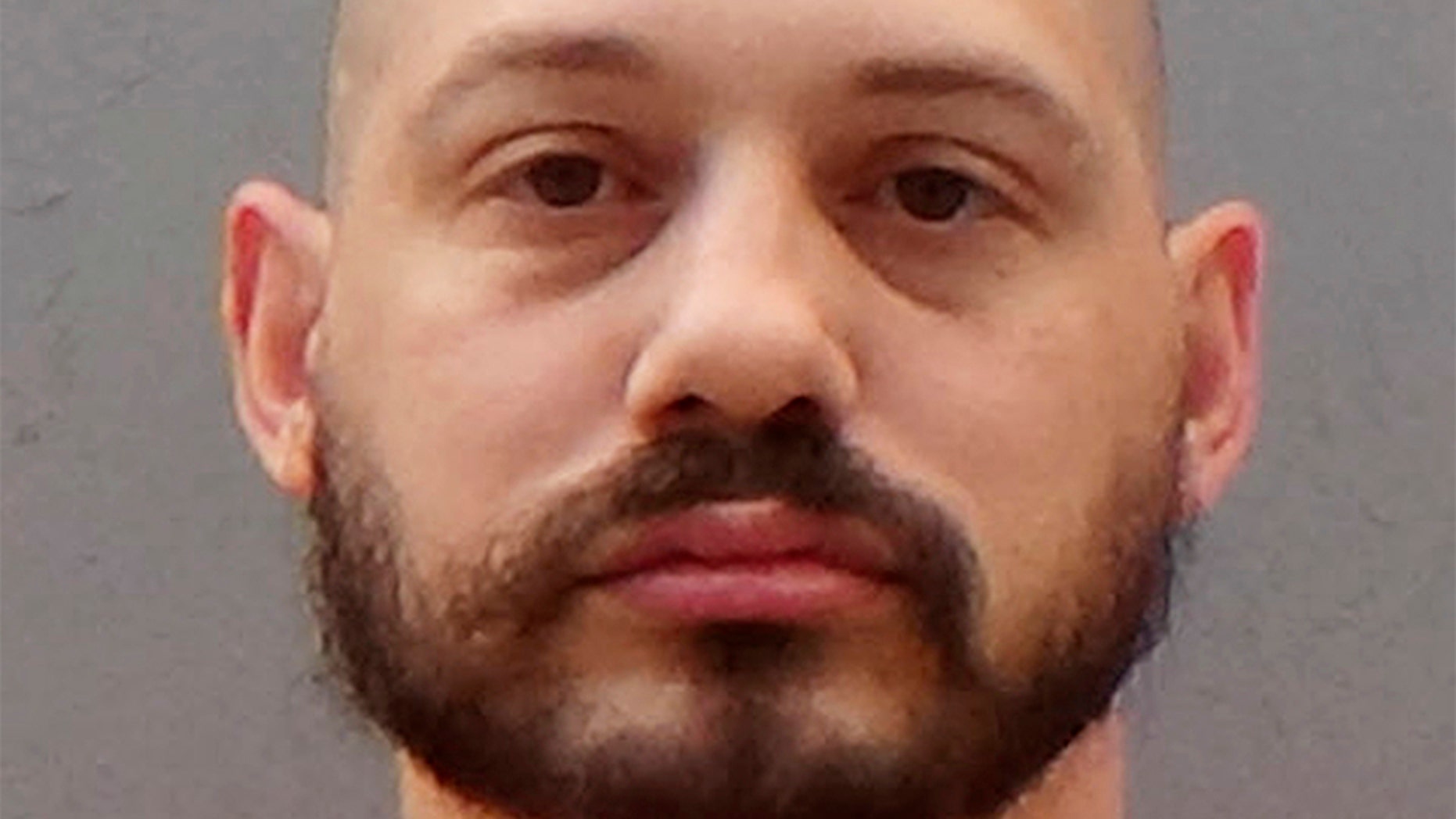 This undated file photo provided by the Arizona Department of Corrections shows Travis Ricci.
