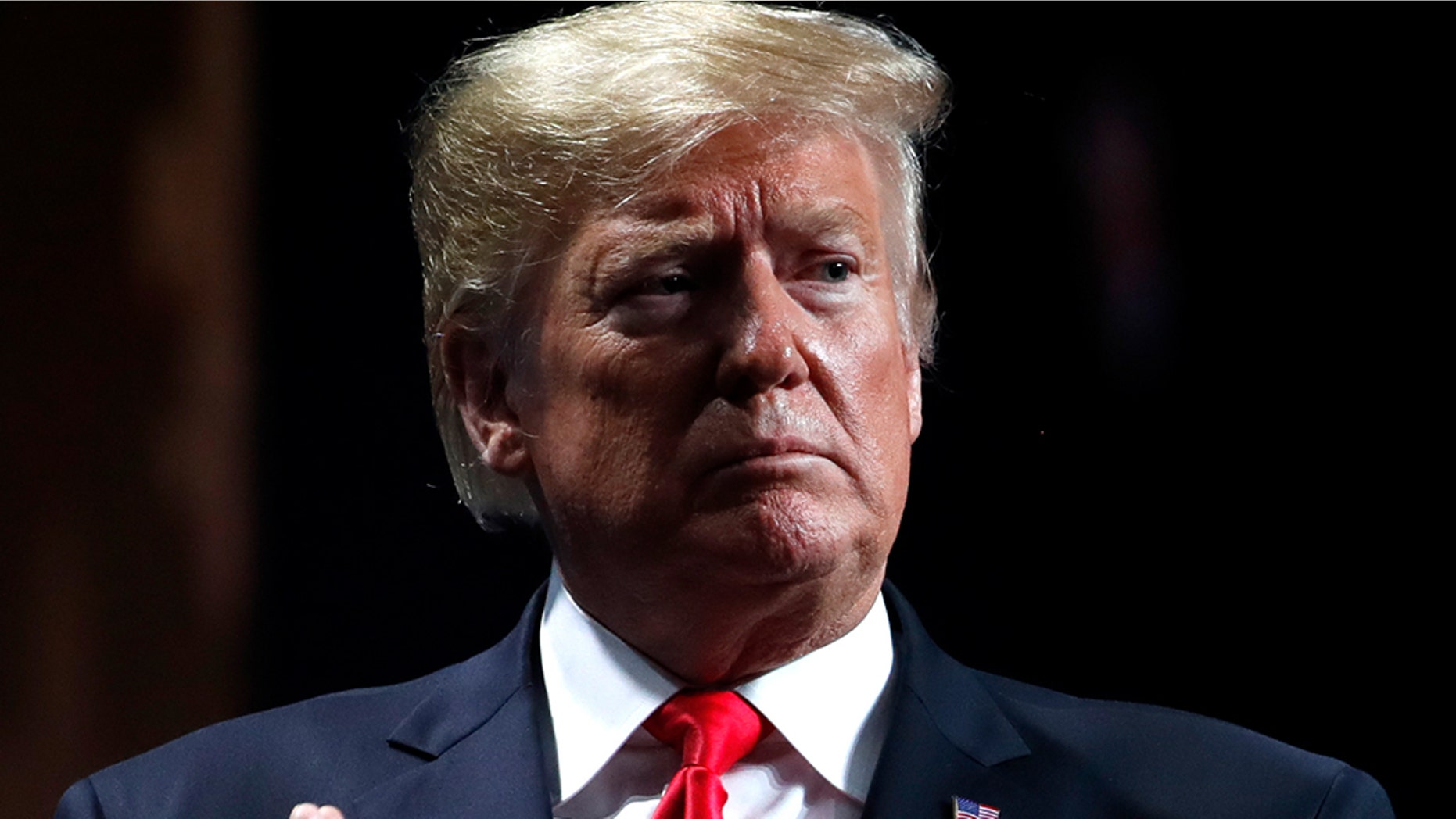 President Donald Trump acknowledges the crowd after speaking at the American Farm Bureau Federation convention in New Orleans, Monday, Jan. 14, 2019. (AP Photo/Jacquelyn Martin)