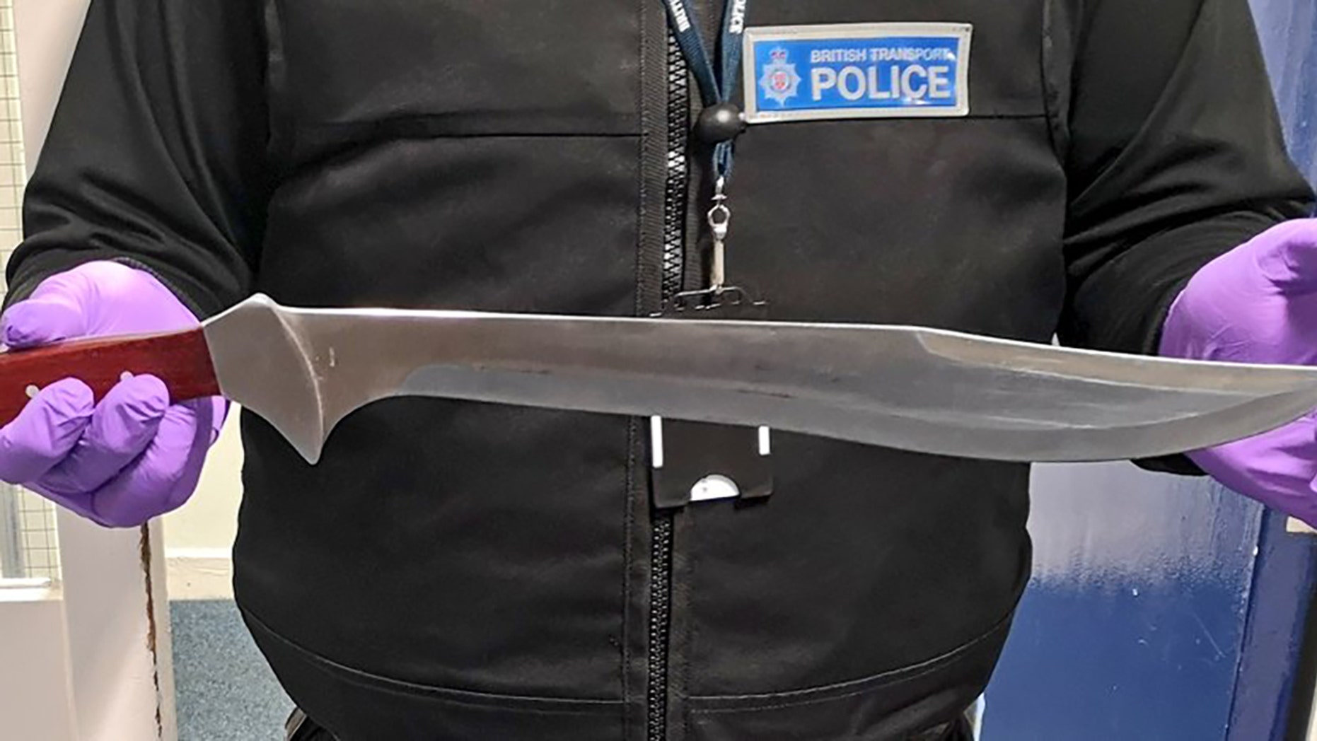 British man arrested after carrying 15-inch machete on train, police say