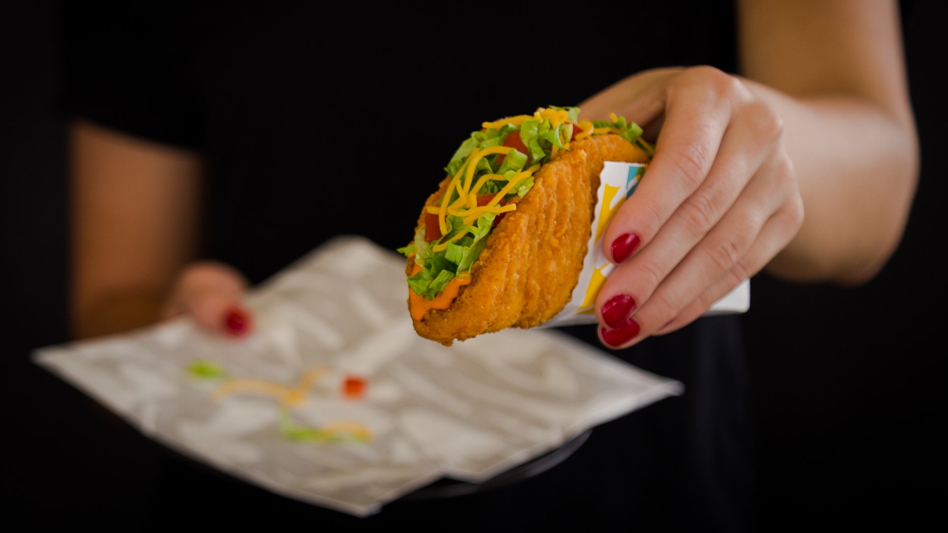 Taco Bell releasing billboard that dispenses real nacho cheese to announce menu item return