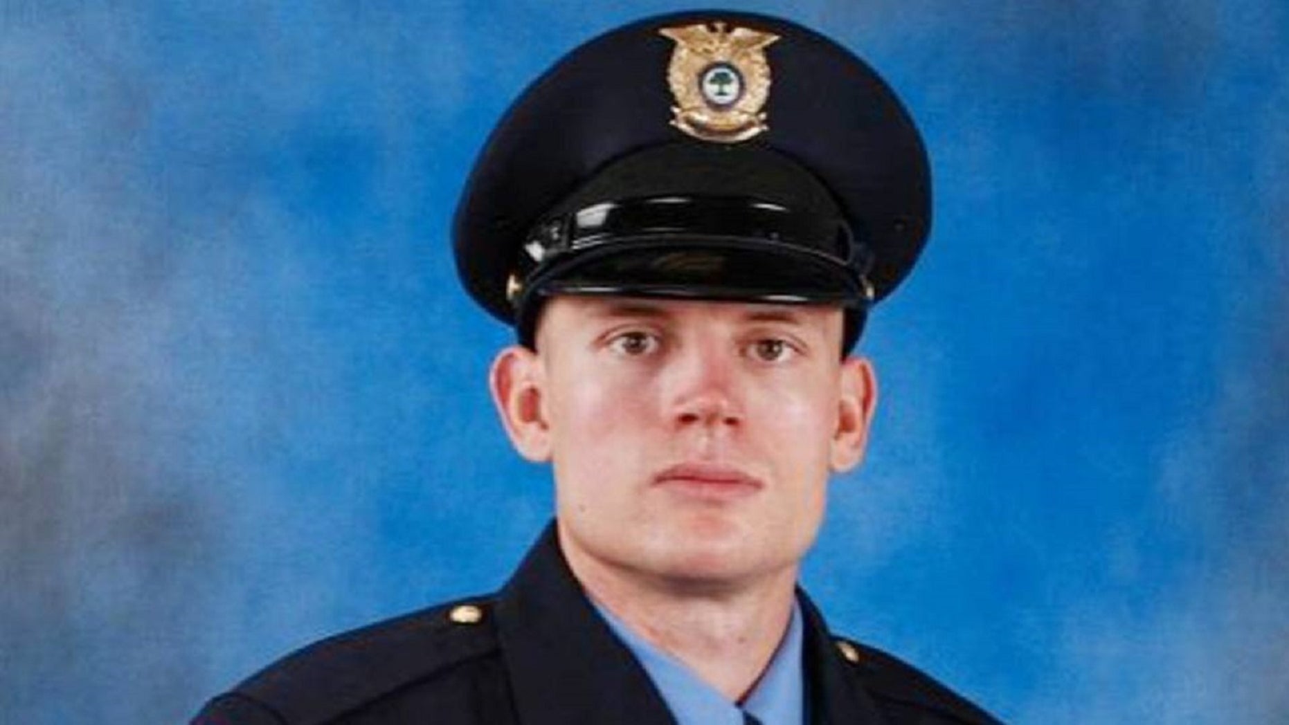 Raleigh cop, now fighting for his life, was shot multiple times at close range, report says