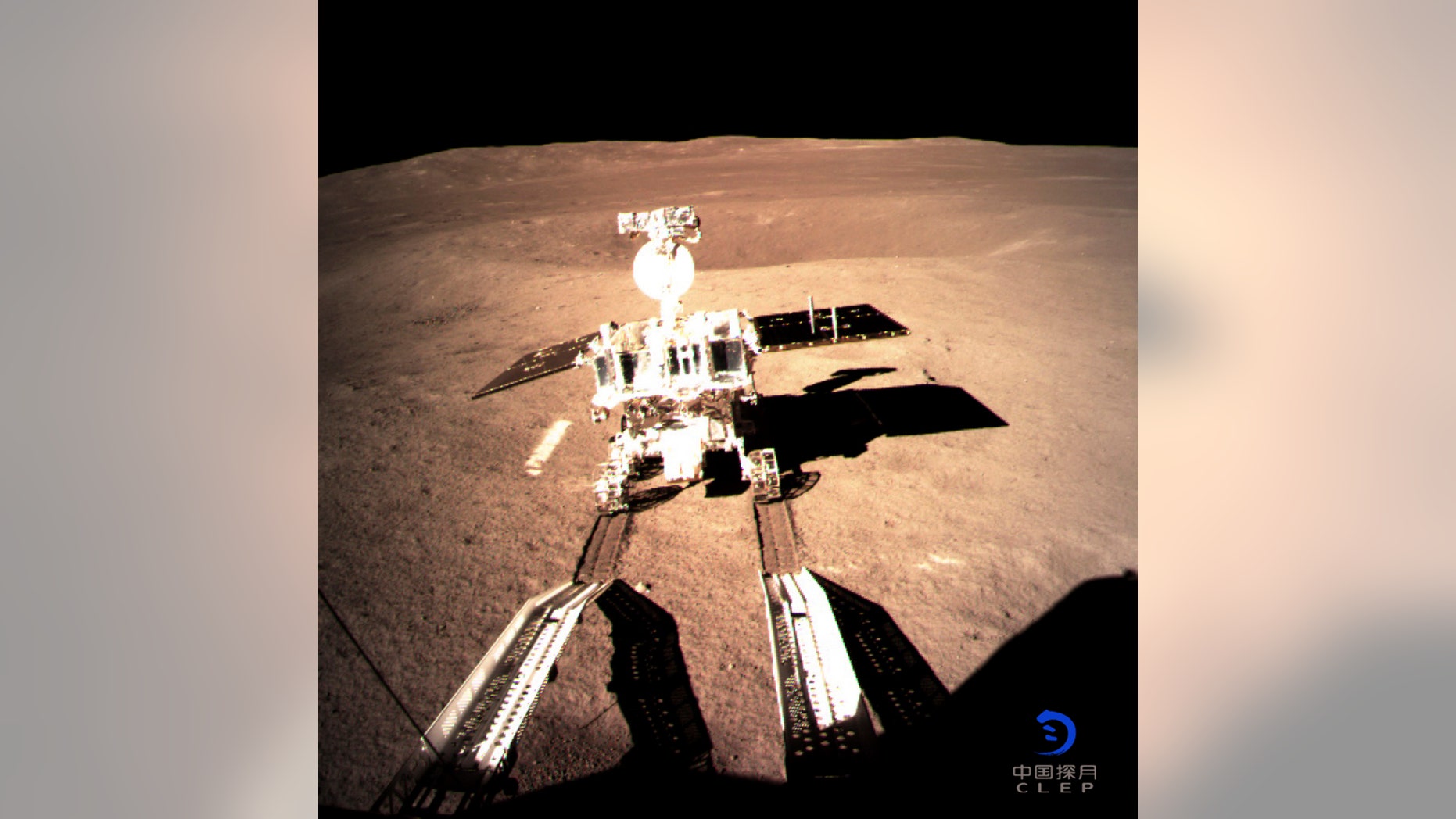 In this photo provided on Thursday, Jan. 3, 2019, by China National Space Administration via Xinhua News Agency, Yutu-2, China's lunar rover, leaves wheel marks after leaving the lander that touched down on the surface of the far side of the Moon.