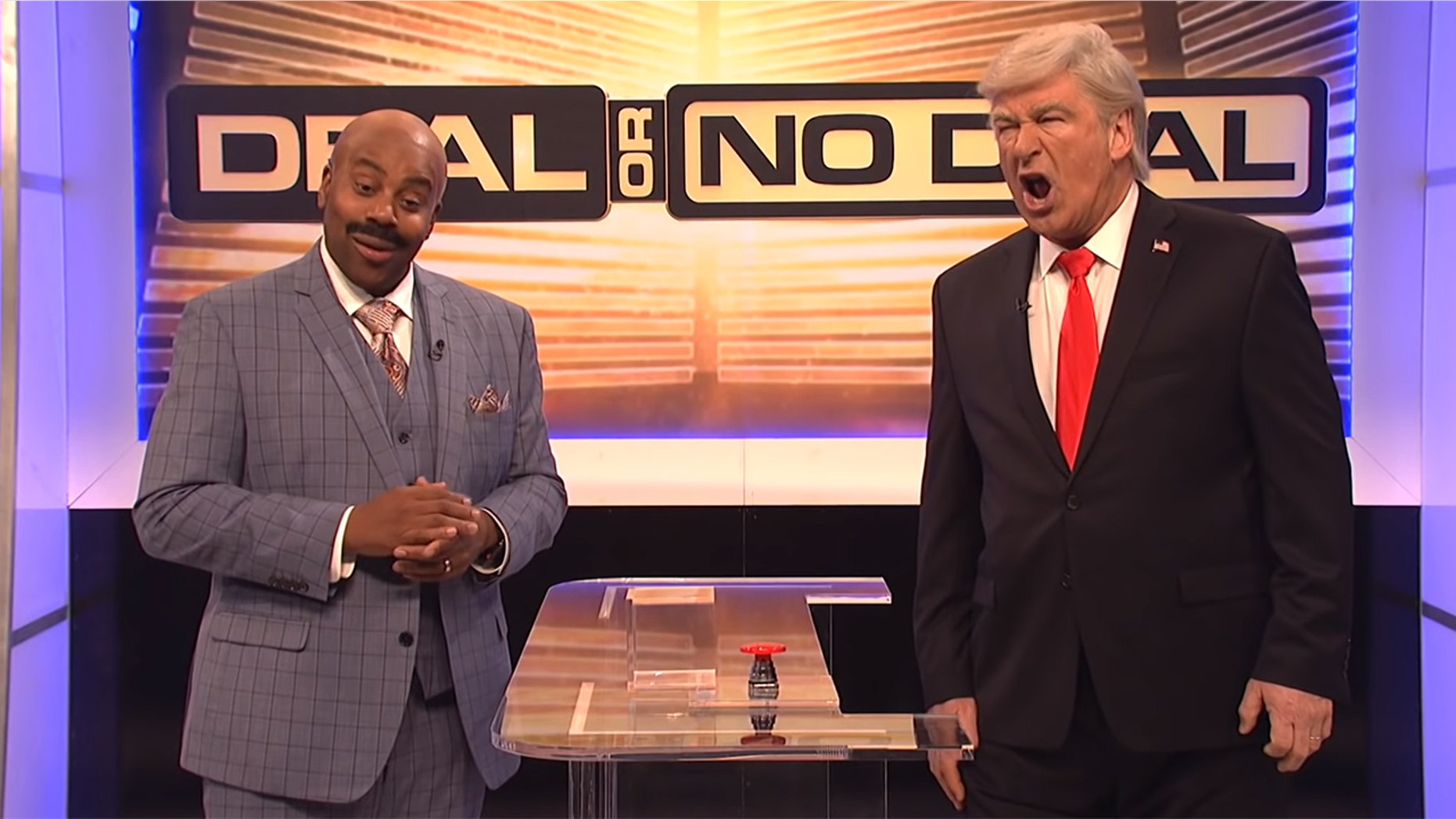 Kenan Thompson as Steve Harvey and Alec Baldwin as Donald Trump in "Saturday Night Live" sketch "Deal or No Deal: Government Shutdown Edition"