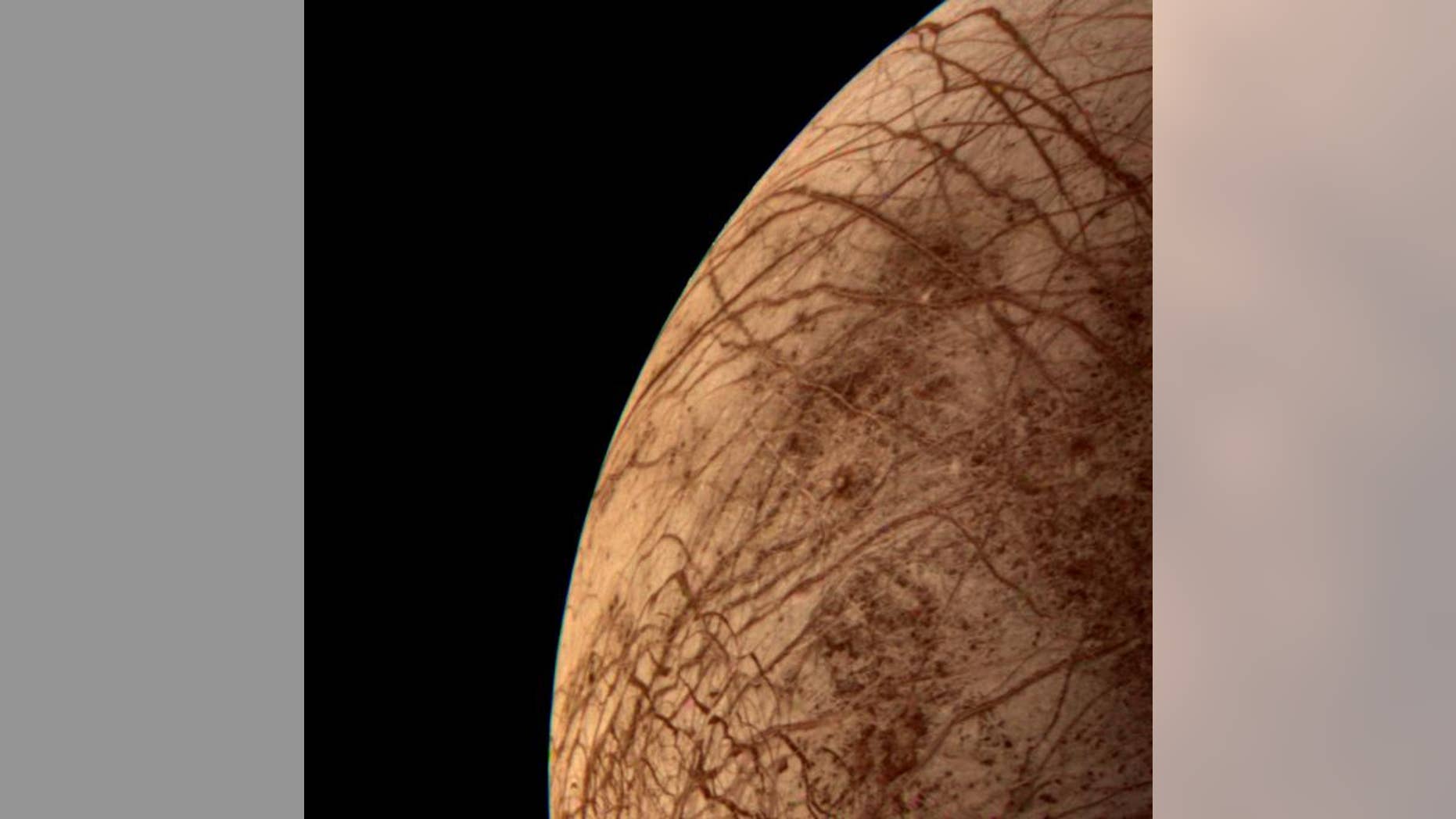 The icy shell on Jupiter's moon Europa may hide a rocky surface that's too strong to be geologically active.
