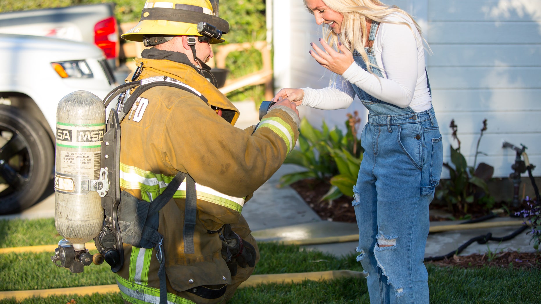 Firefighter stages dramatic blaze in his own home during family party to propose to girlfriend