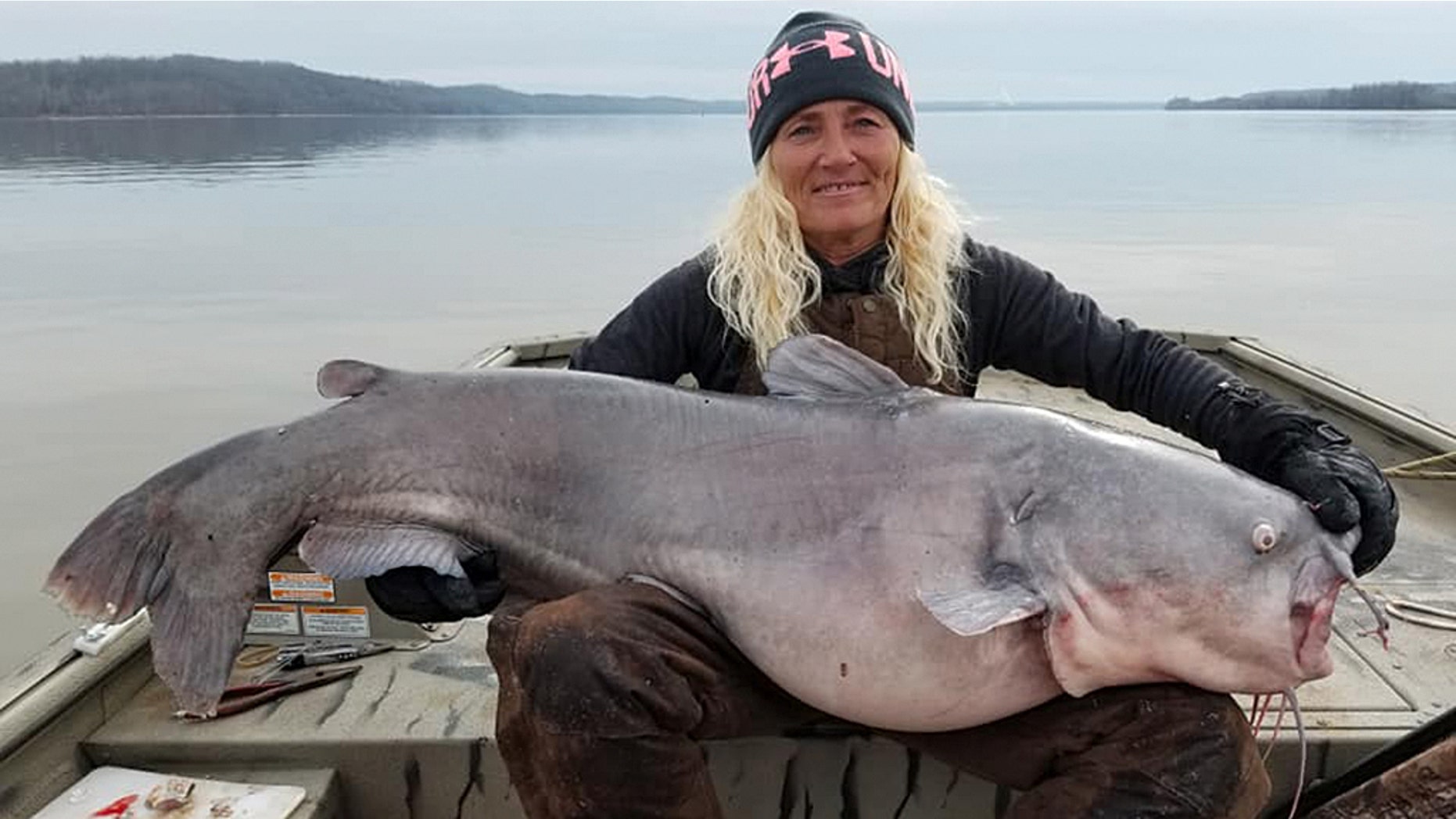 Paula Cathey Smith shows off her massive catch.