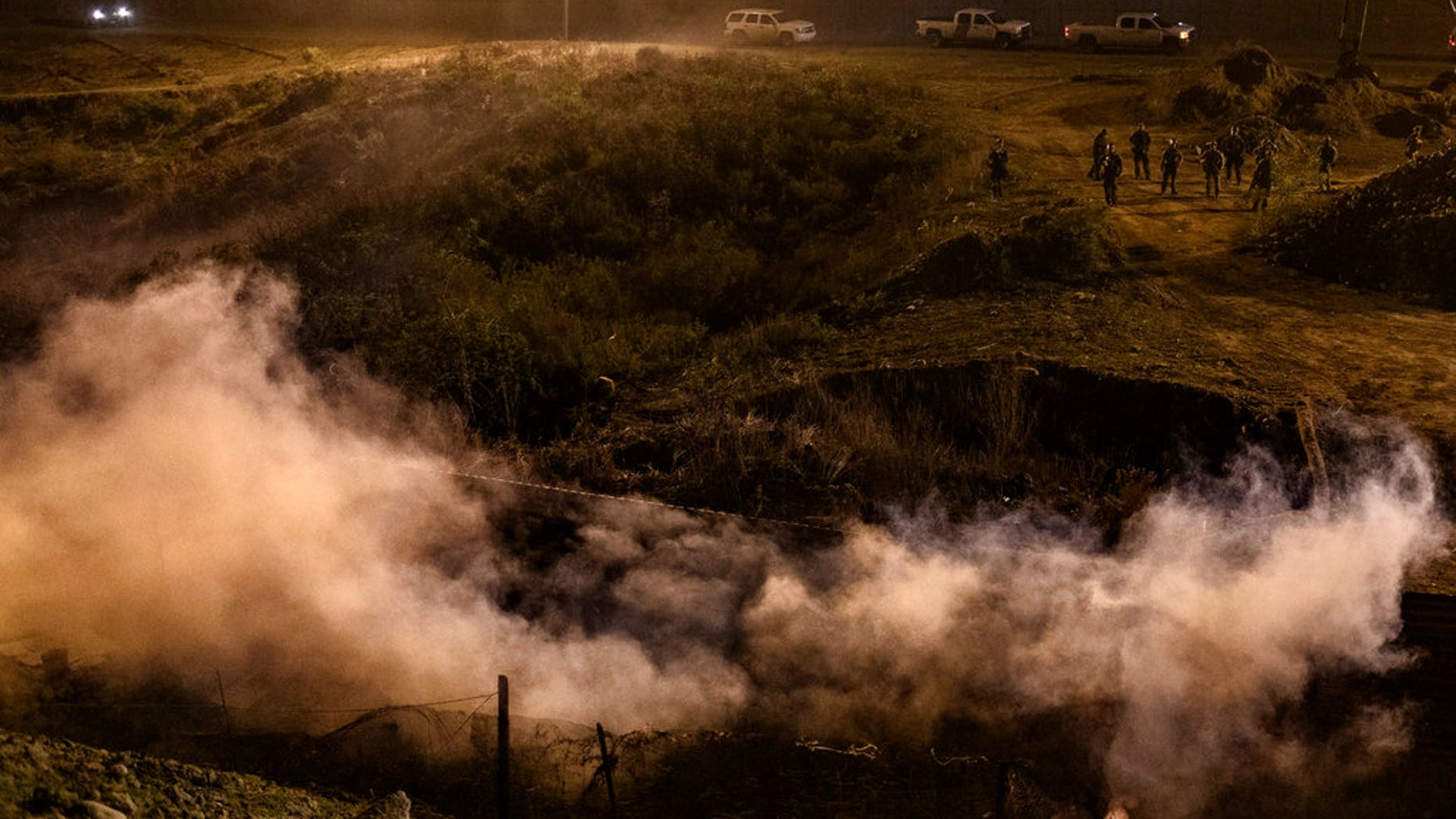 Authorities use tear gas to stop migrants at southern border