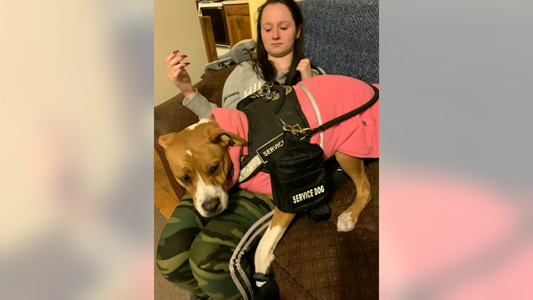 Baker's service dog can sniff out life-threatening odors, as well as alert to her an oncoming reaction.