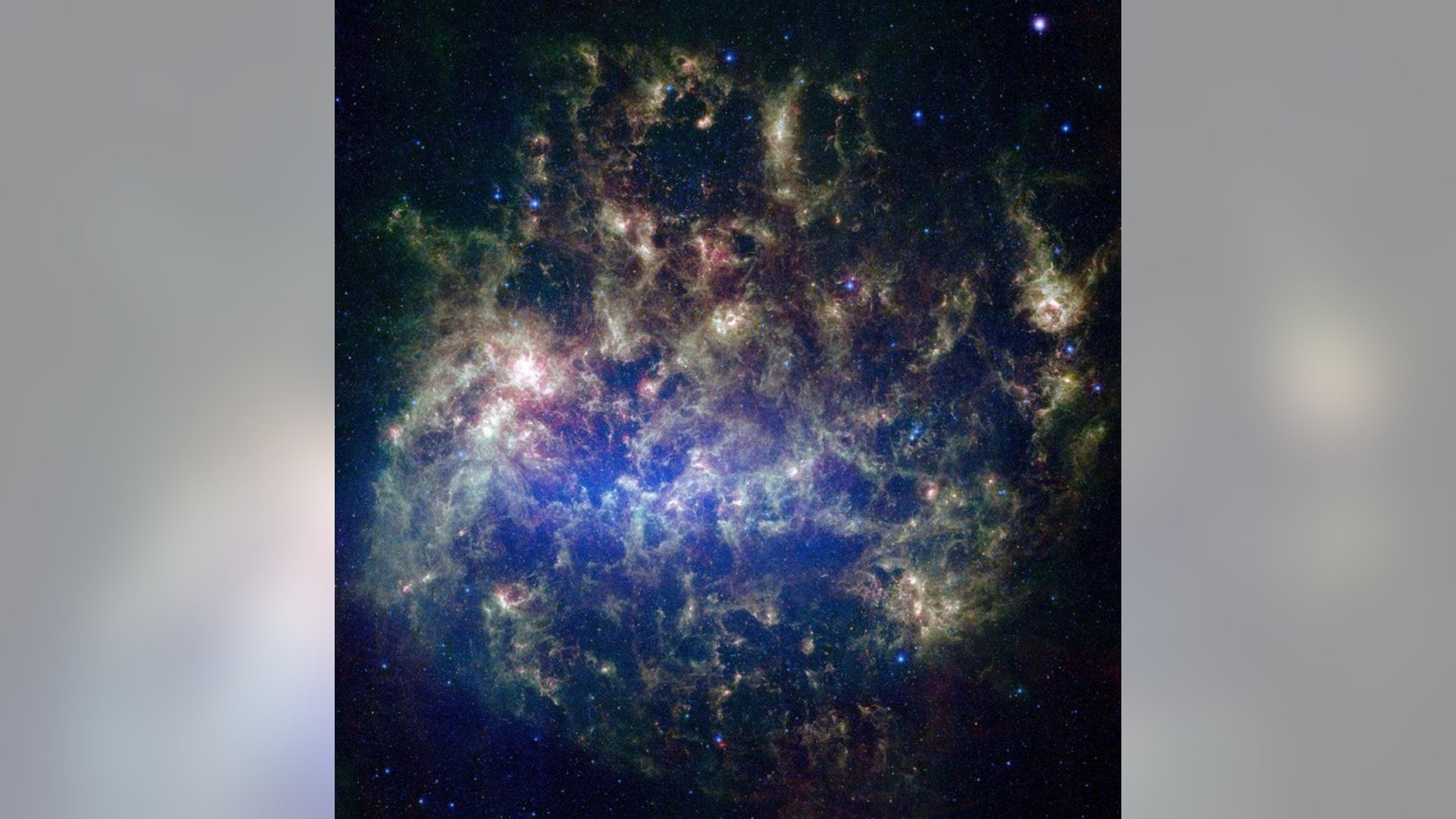 The image of NASA's Spitzer Space Telescope shows a large magical cloud.