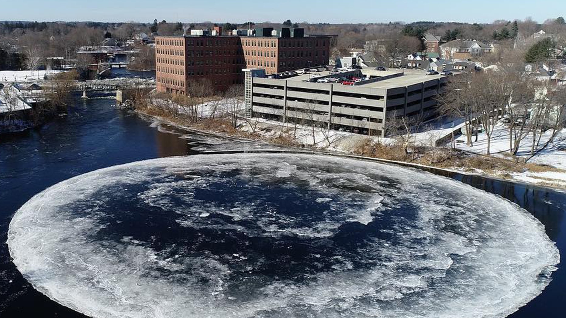 Alien-looking, gigantic rotating ice disk forms in Maine river